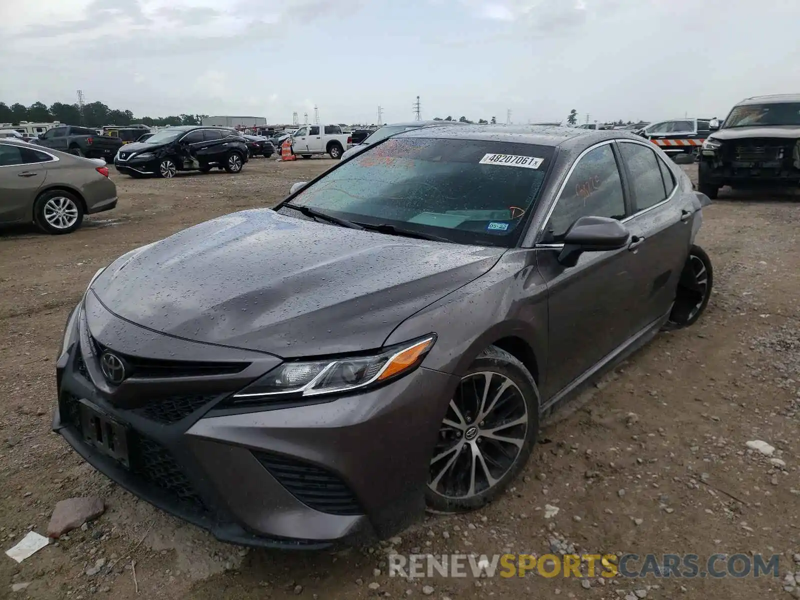 2 Photograph of a damaged car 4T1B11HK1KU734283 TOYOTA CAMRY 2019