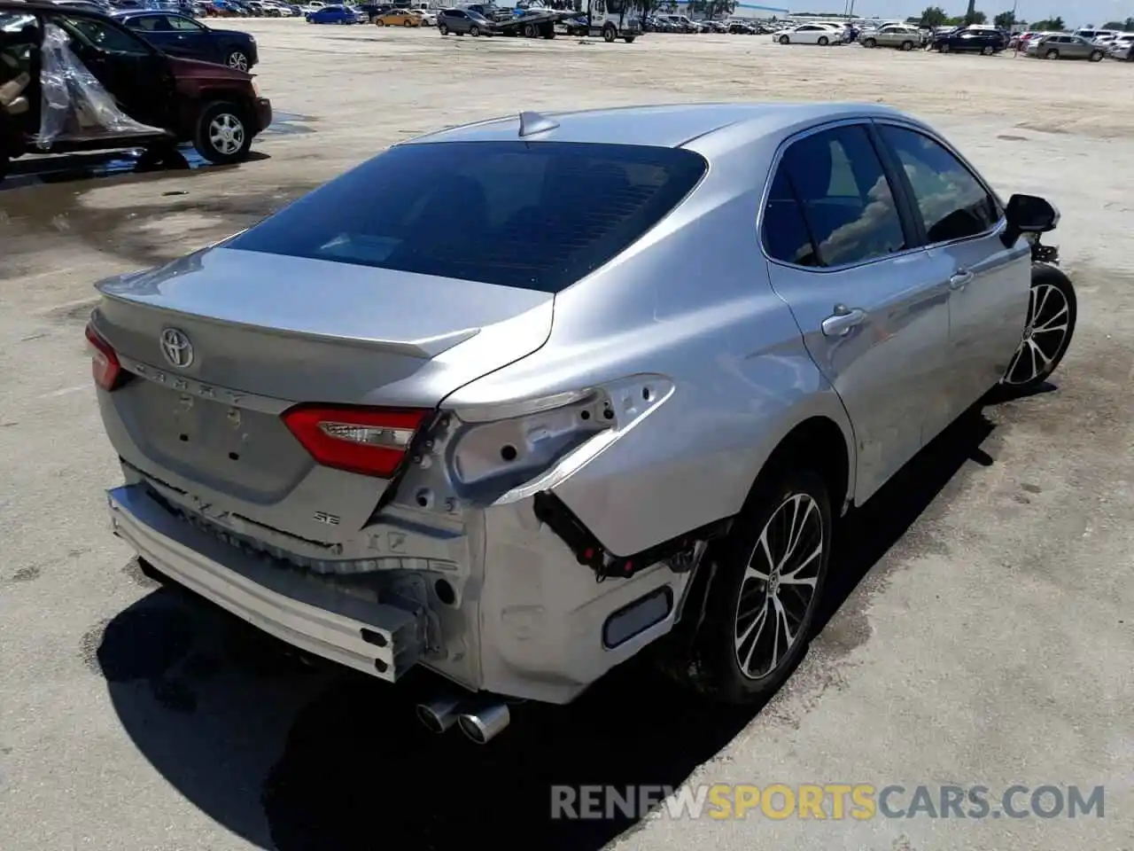 4 Photograph of a damaged car 4T1B11HK1KU734297 TOYOTA CAMRY 2019