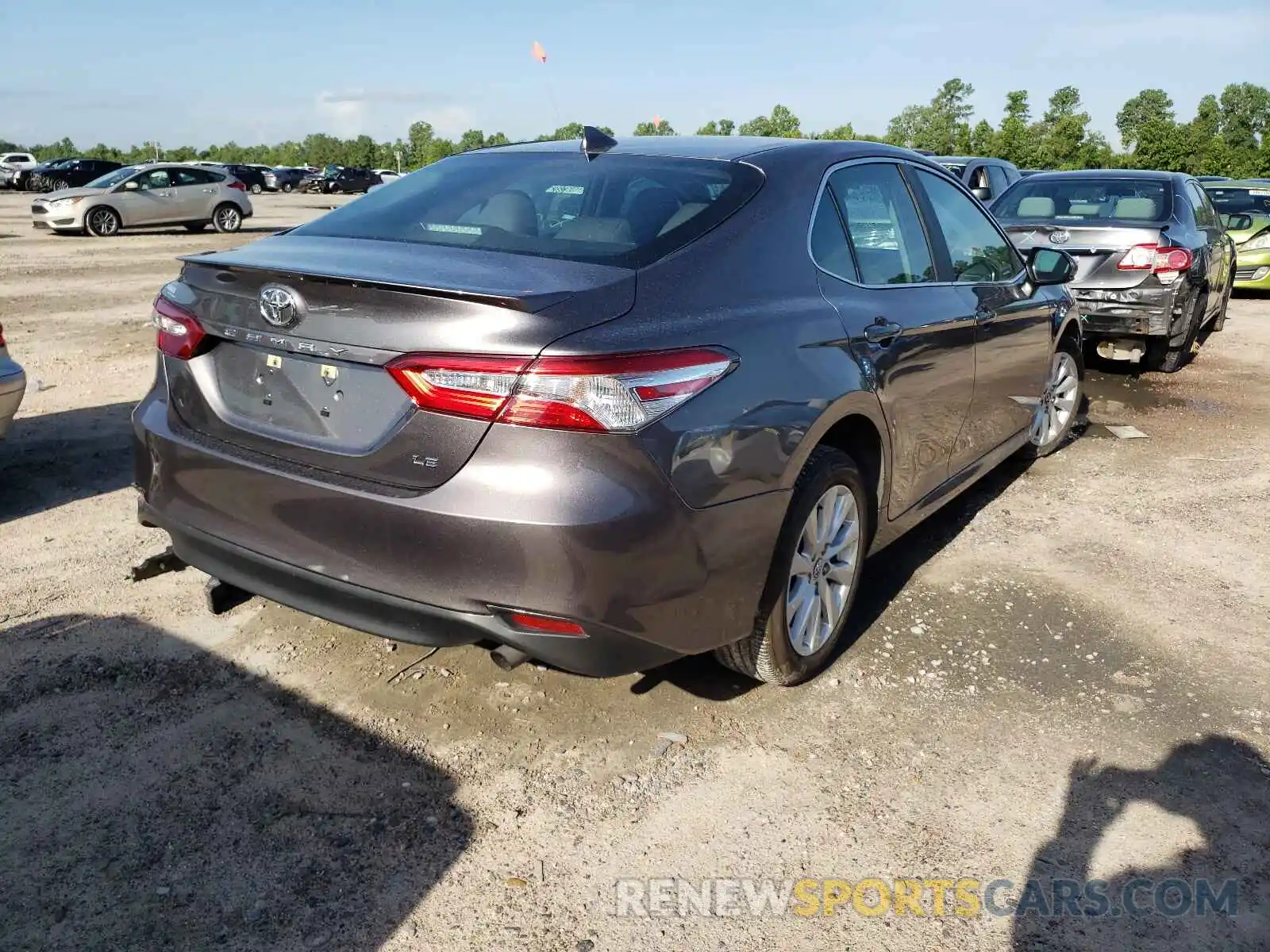 4 Photograph of a damaged car 4T1B11HK1KU734719 TOYOTA CAMRY 2019