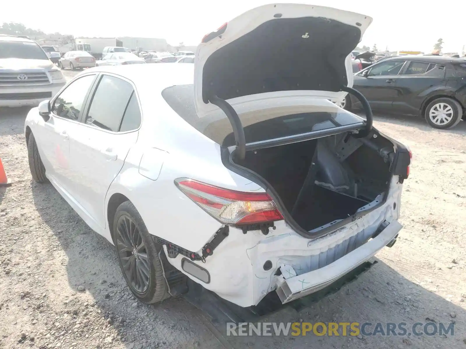 3 Photograph of a damaged car 4T1B11HK1KU738012 TOYOTA CAMRY 2019