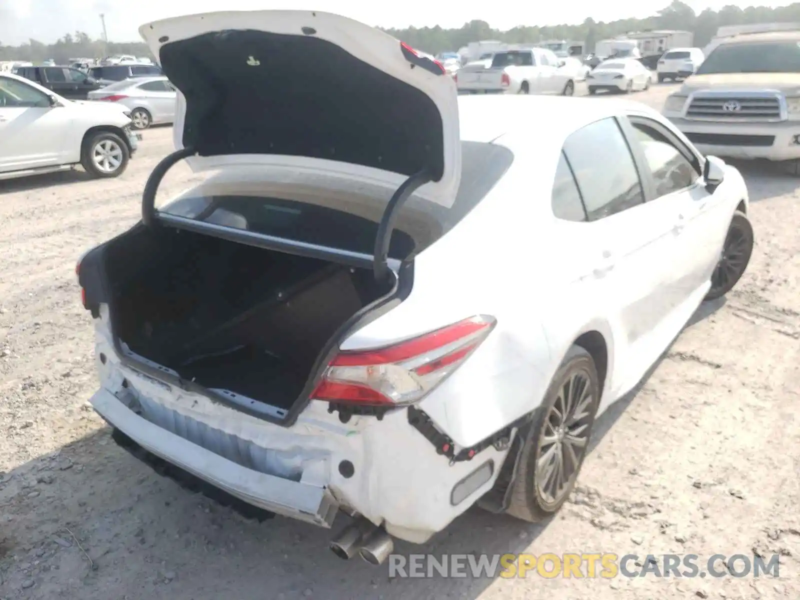 4 Photograph of a damaged car 4T1B11HK1KU738012 TOYOTA CAMRY 2019