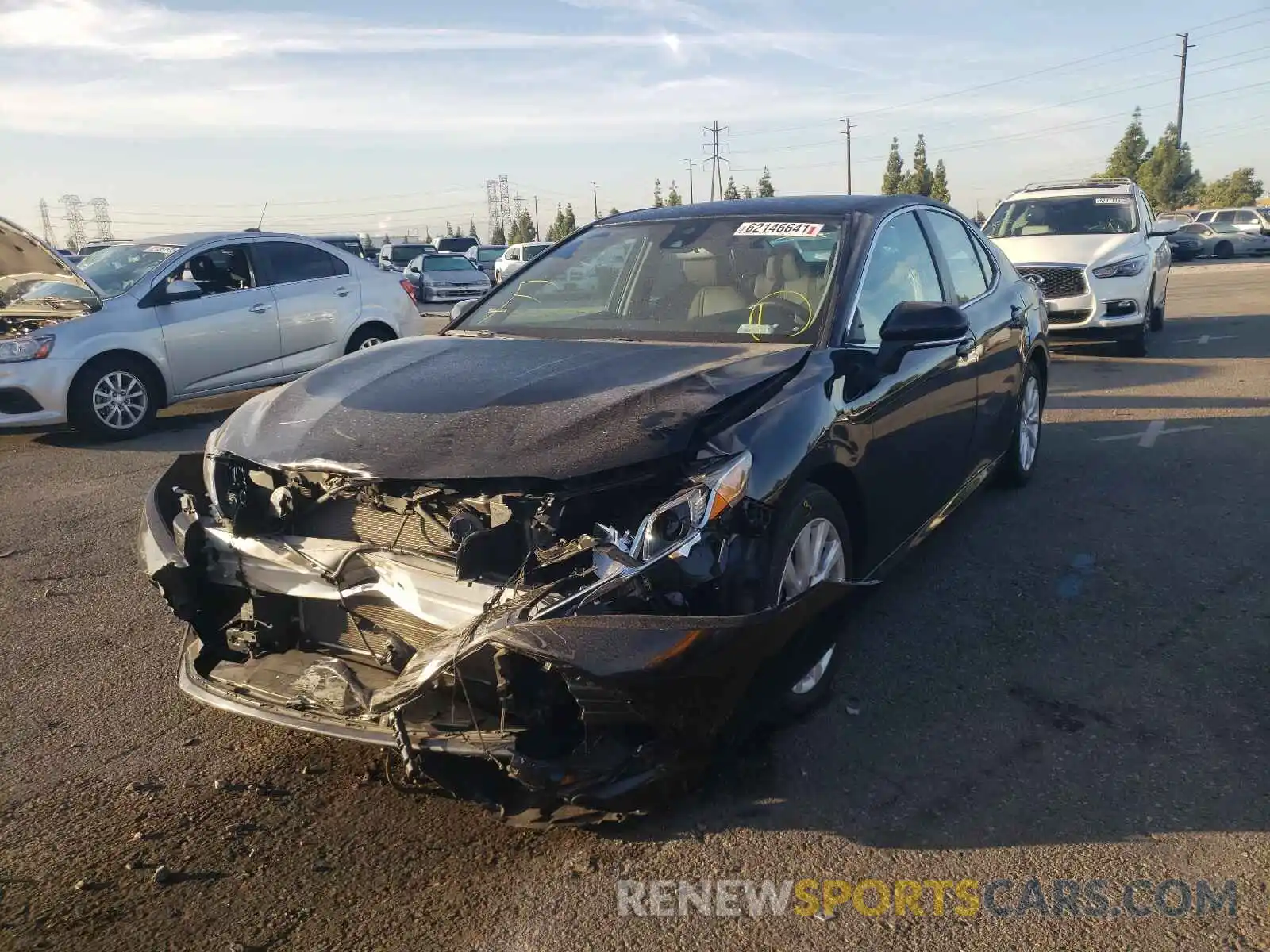 2 Photograph of a damaged car 4T1B11HK1KU738043 TOYOTA CAMRY 2019