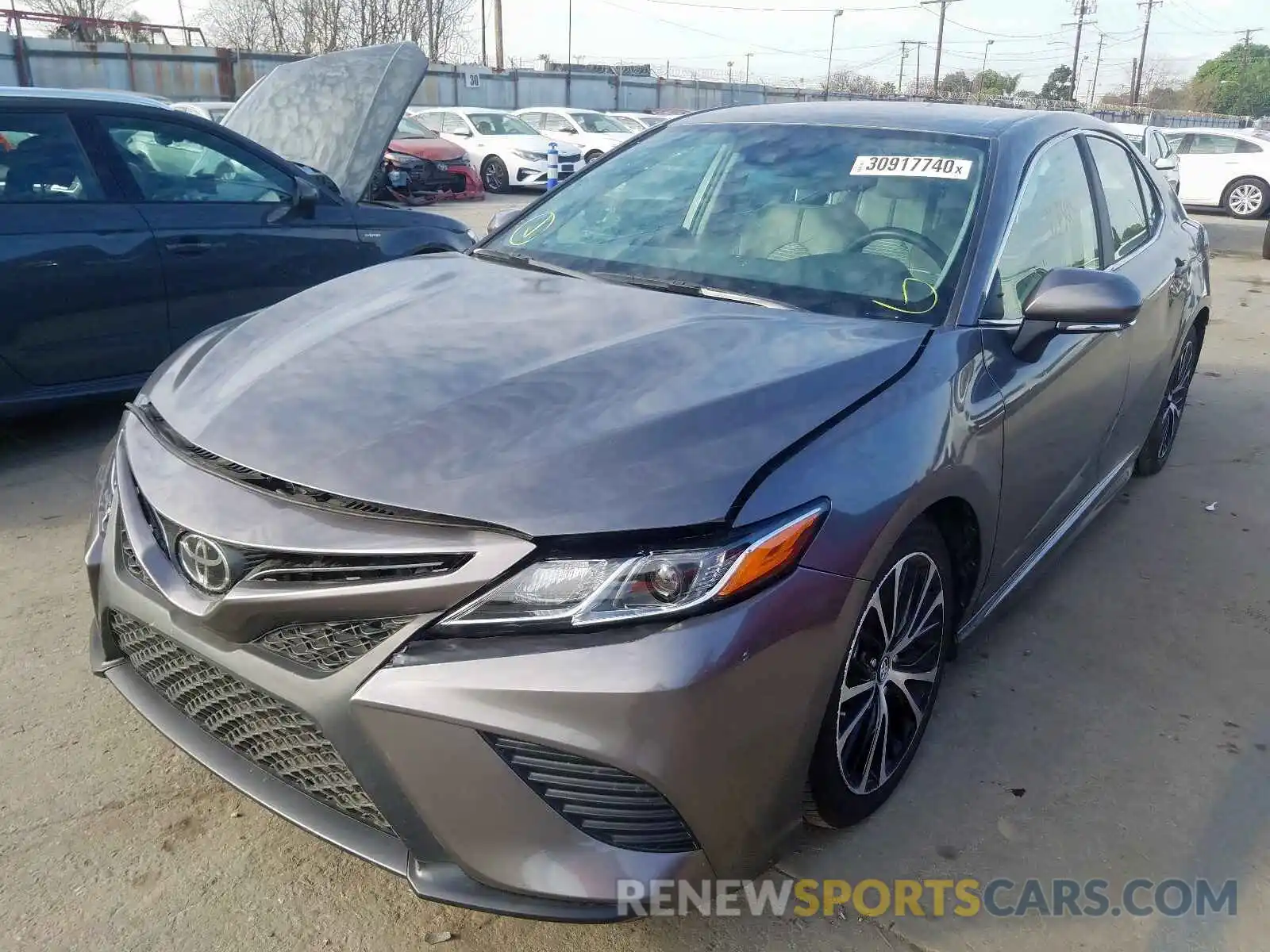 2 Photograph of a damaged car 4T1B11HK1KU739760 TOYOTA CAMRY 2019