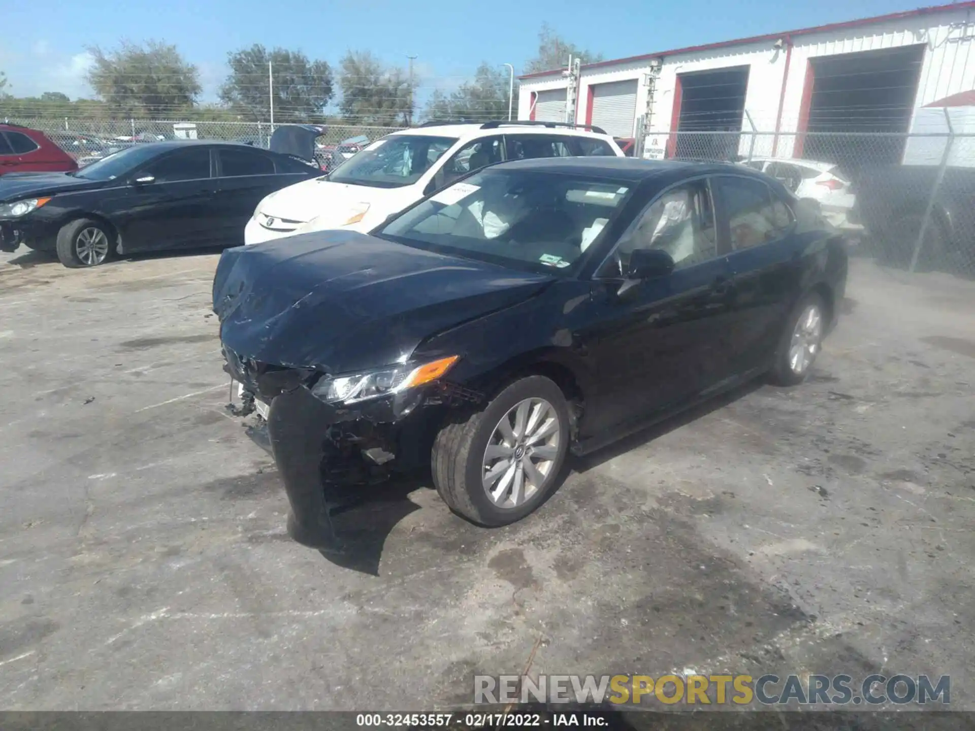 2 Photograph of a damaged car 4T1B11HK1KU740424 TOYOTA CAMRY 2019