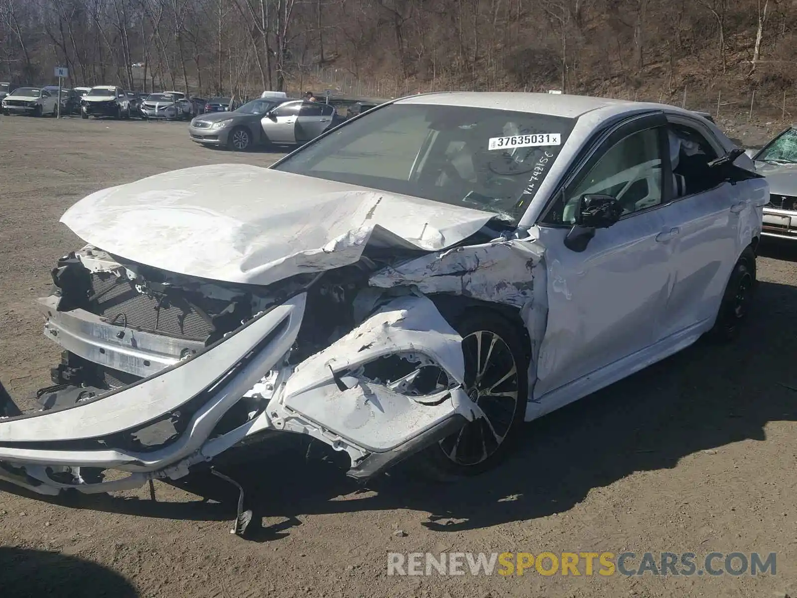 2 Photograph of a damaged car 4T1B11HK1KU742156 TOYOTA CAMRY 2019