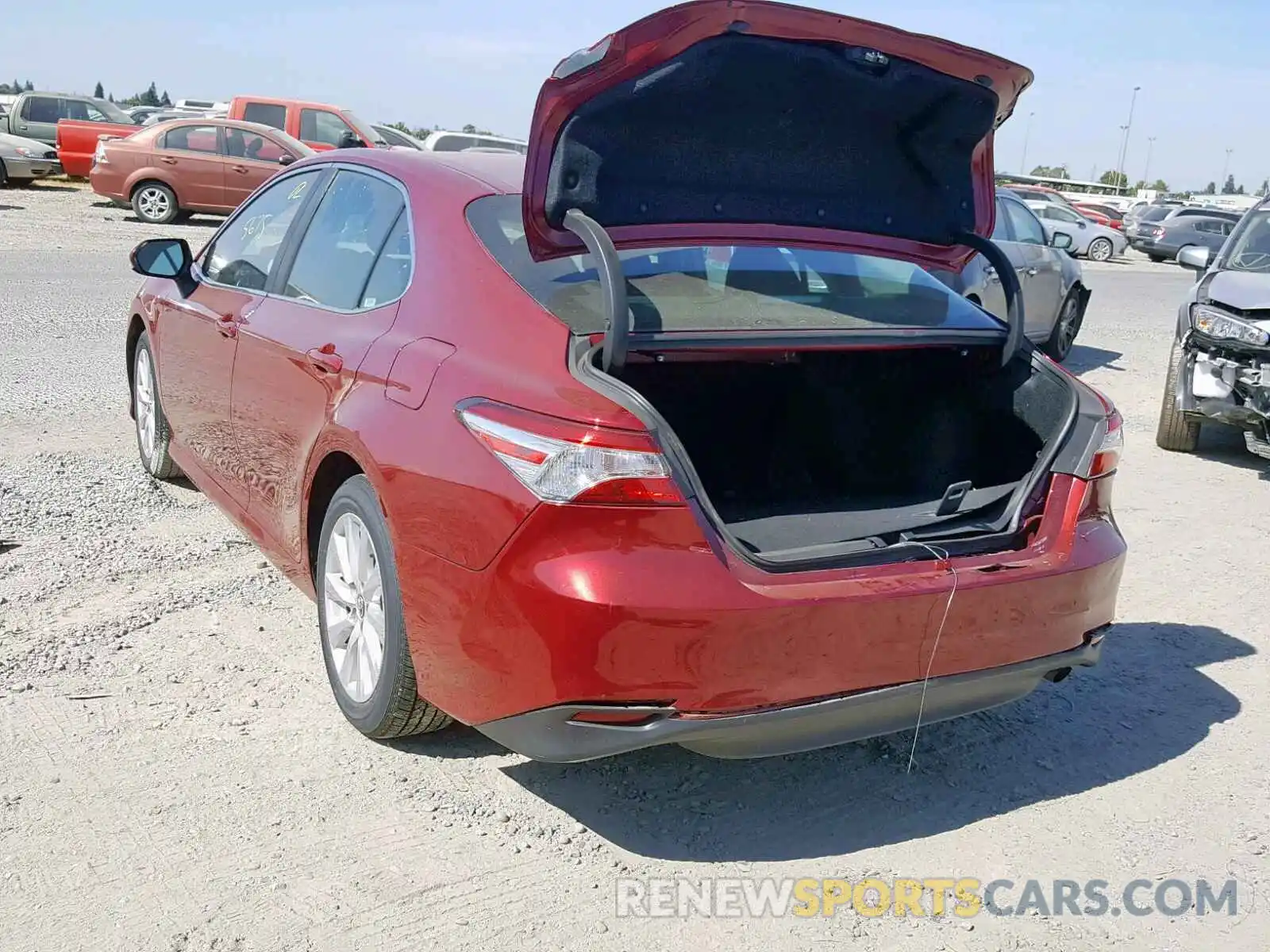 3 Photograph of a damaged car 4T1B11HK1KU742318 TOYOTA CAMRY 2019