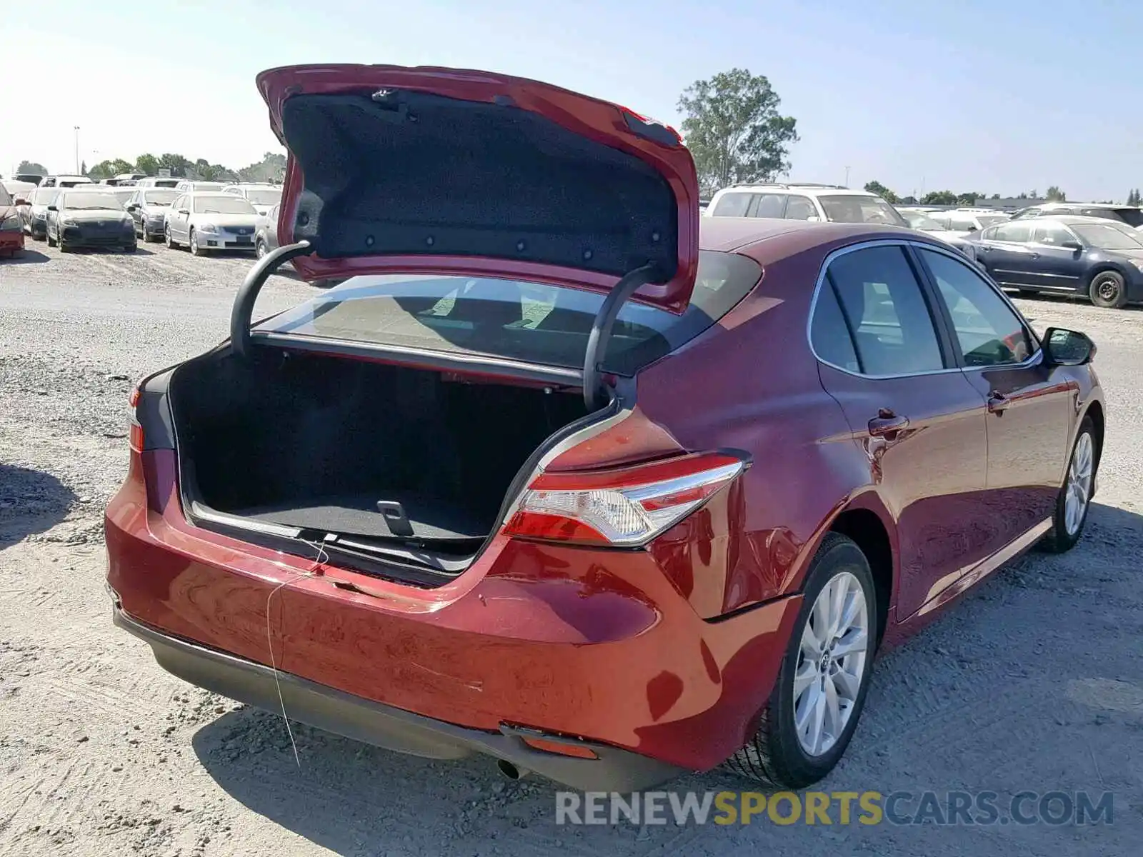 4 Photograph of a damaged car 4T1B11HK1KU742318 TOYOTA CAMRY 2019