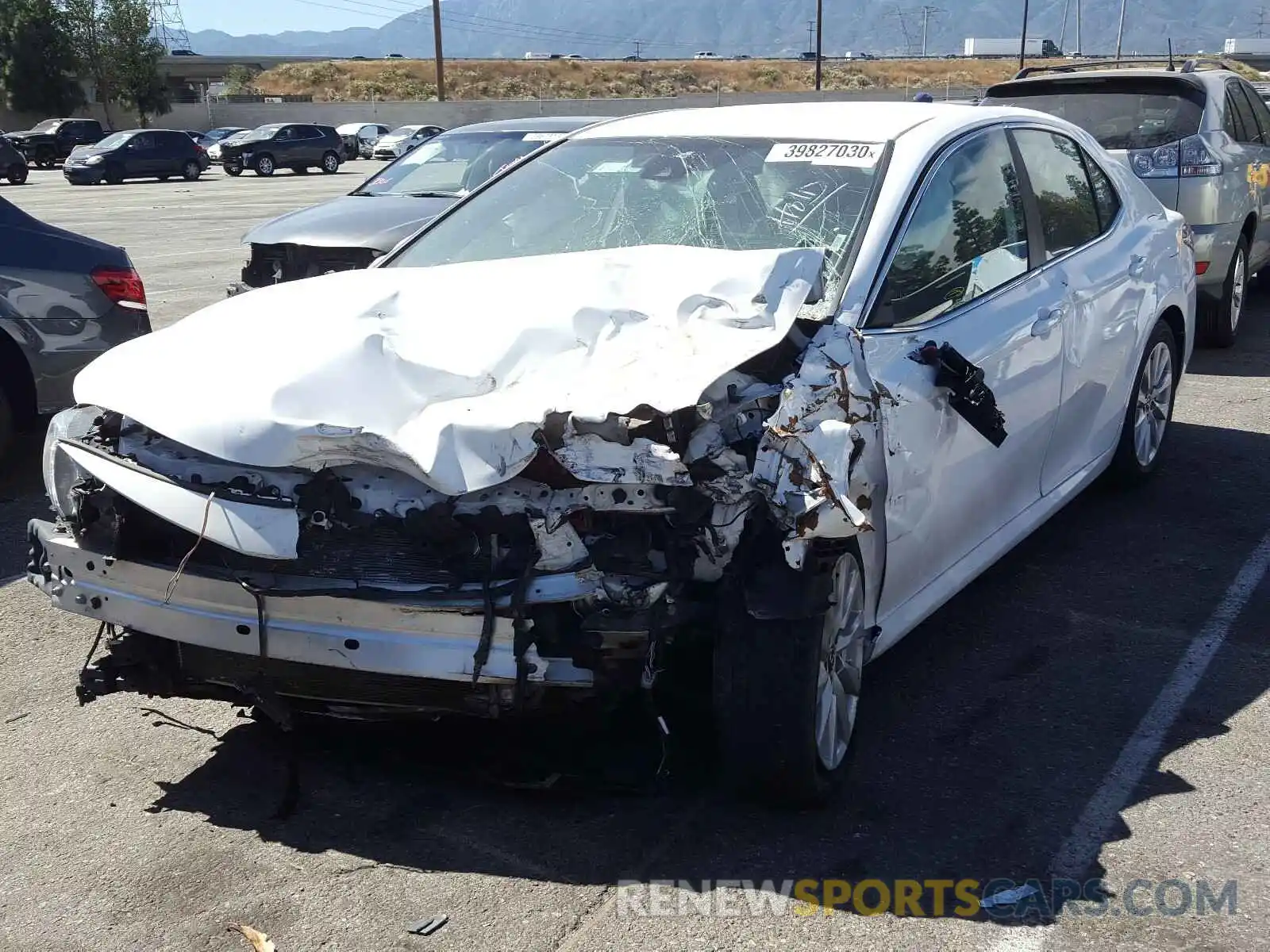 2 Photograph of a damaged car 4T1B11HK1KU744327 TOYOTA CAMRY 2019