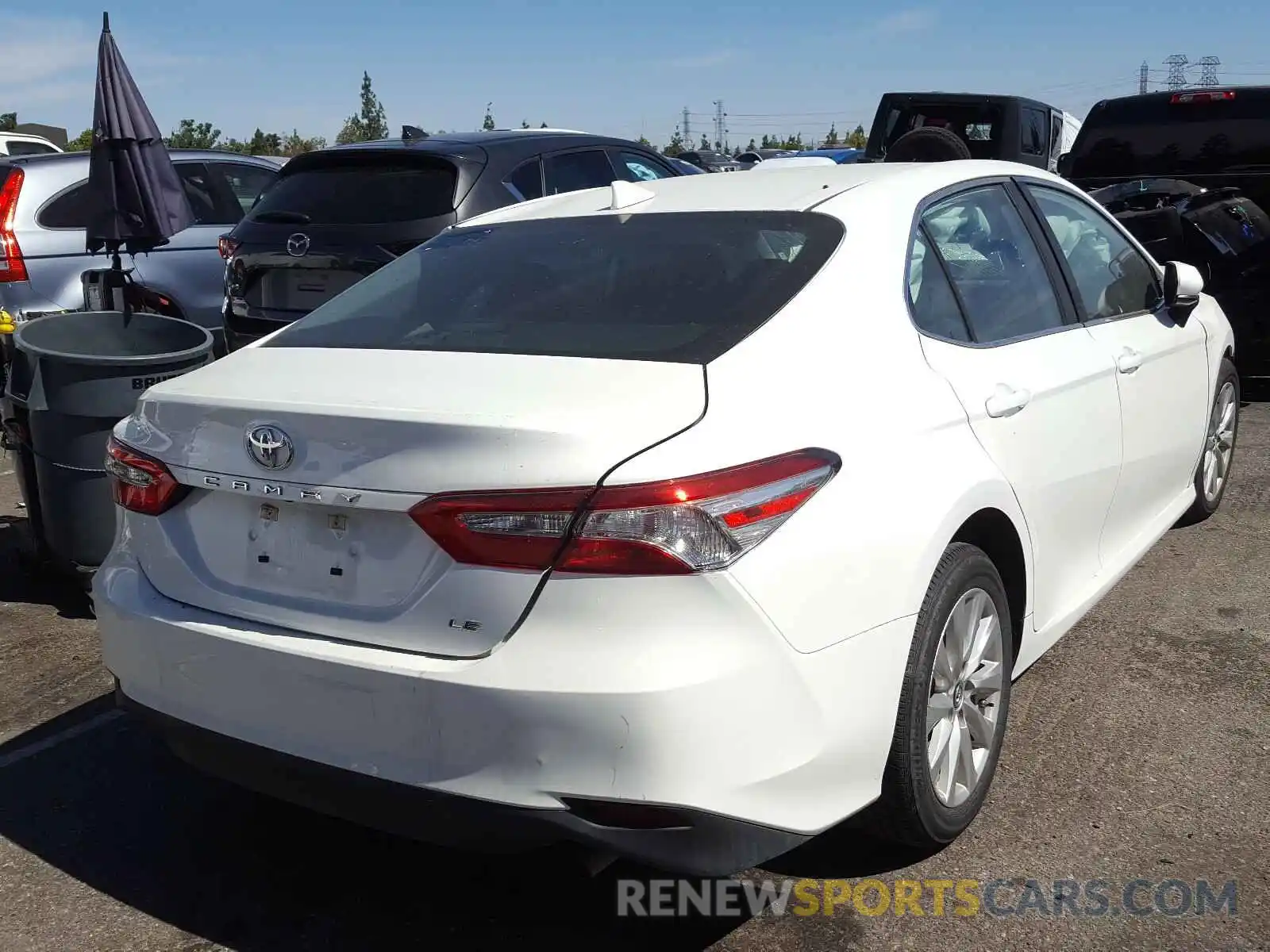 4 Photograph of a damaged car 4T1B11HK1KU744327 TOYOTA CAMRY 2019