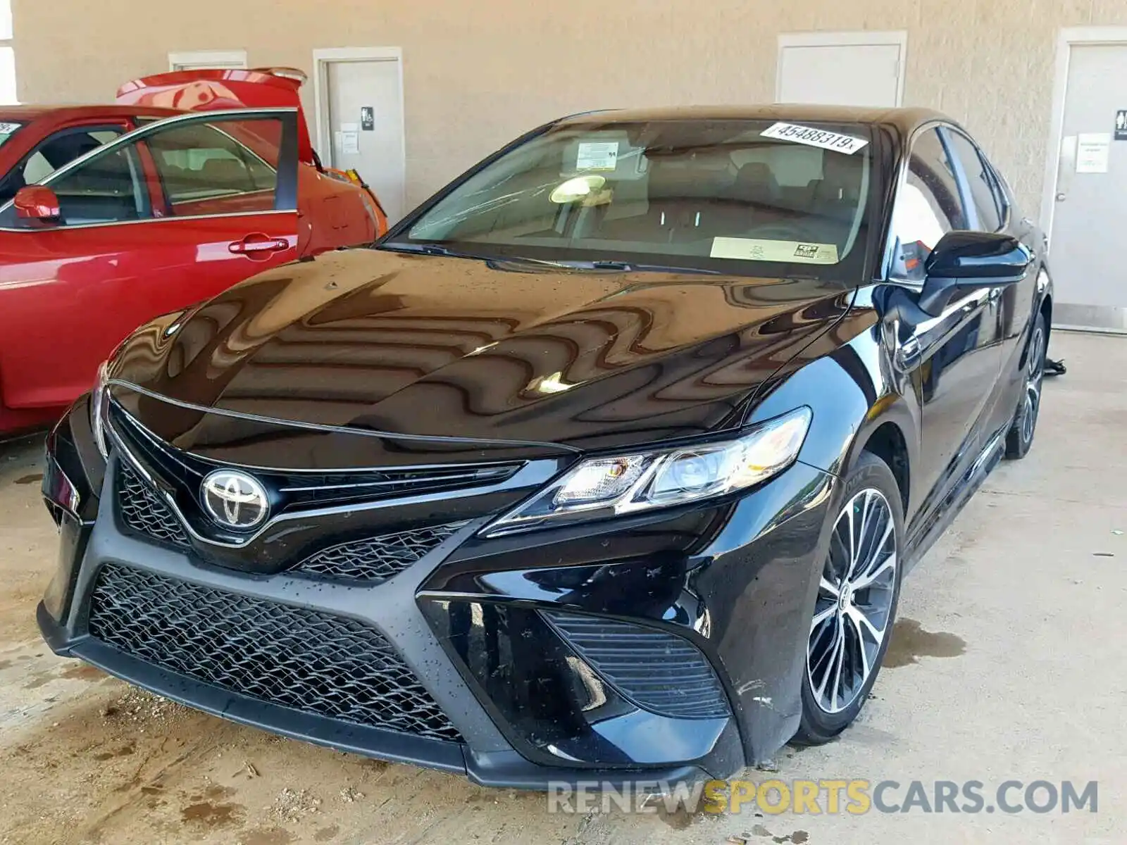 2 Photograph of a damaged car 4T1B11HK1KU744912 TOYOTA CAMRY 2019