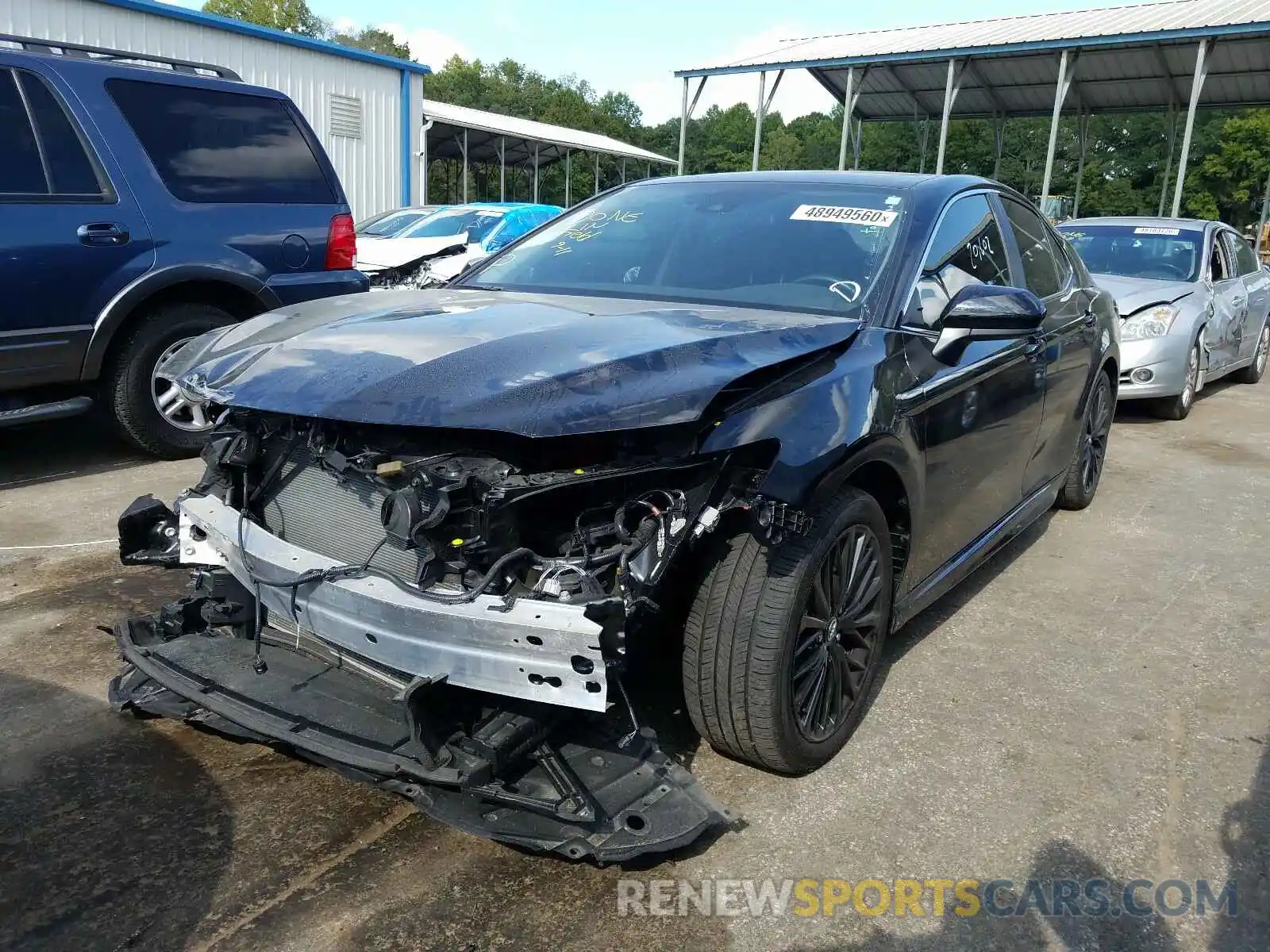 2 Photograph of a damaged car 4T1B11HK1KU748698 TOYOTA CAMRY 2019