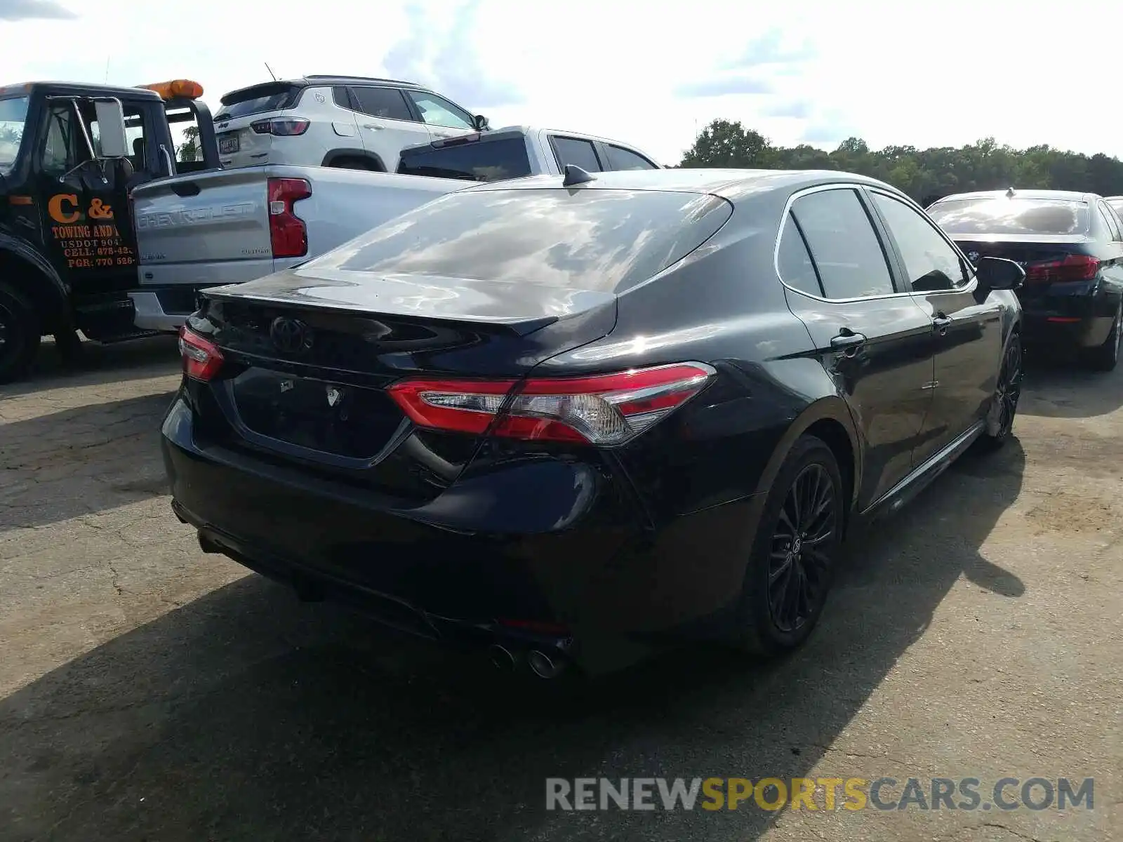 4 Photograph of a damaged car 4T1B11HK1KU748698 TOYOTA CAMRY 2019