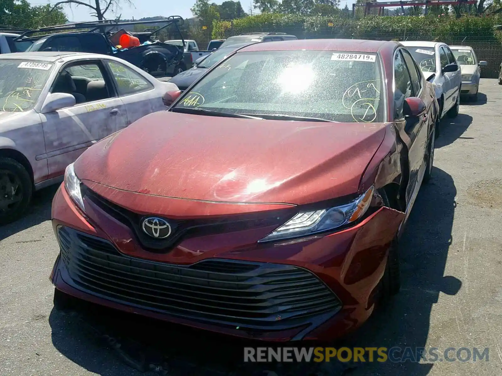 2 Photograph of a damaged car 4T1B11HK1KU749981 TOYOTA CAMRY 2019