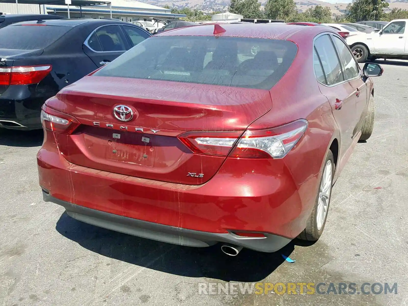 4 Photograph of a damaged car 4T1B11HK1KU749981 TOYOTA CAMRY 2019