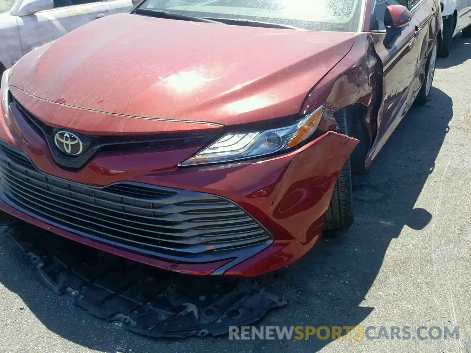 9 Photograph of a damaged car 4T1B11HK1KU749981 TOYOTA CAMRY 2019