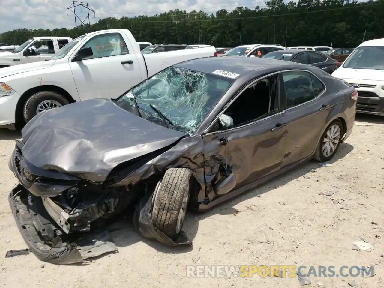 2 Photograph of a damaged car 4T1B11HK1KU750614 TOYOTA CAMRY 2019