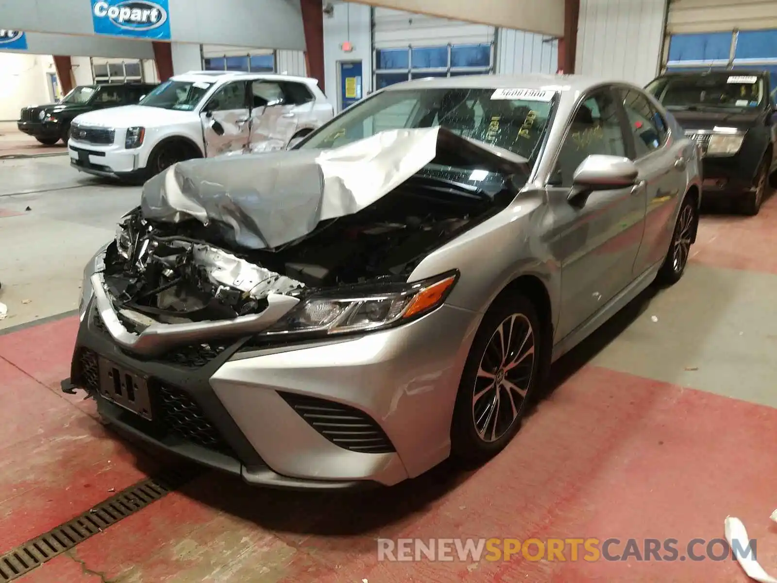 2 Photograph of a damaged car 4T1B11HK1KU751567 TOYOTA CAMRY 2019