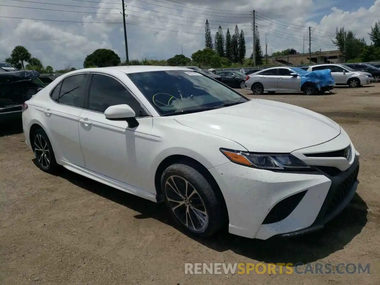 1 Photograph of a damaged car 4T1B11HK1KU752119 TOYOTA CAMRY 2019