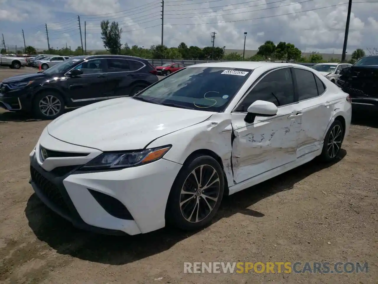 2 Photograph of a damaged car 4T1B11HK1KU752119 TOYOTA CAMRY 2019