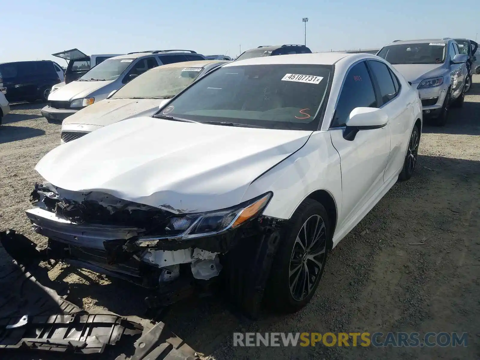 2 Photograph of a damaged car 4T1B11HK1KU752184 TOYOTA CAMRY 2019