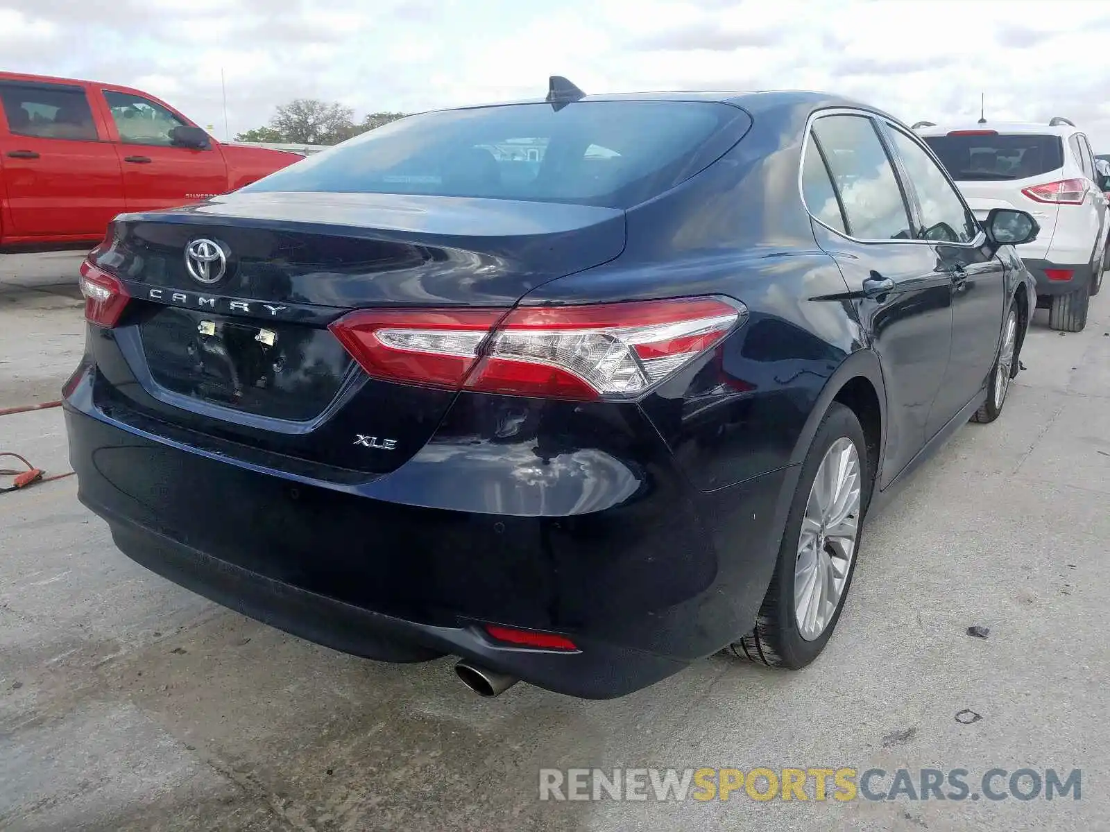 4 Photograph of a damaged car 4T1B11HK1KU752959 TOYOTA CAMRY 2019