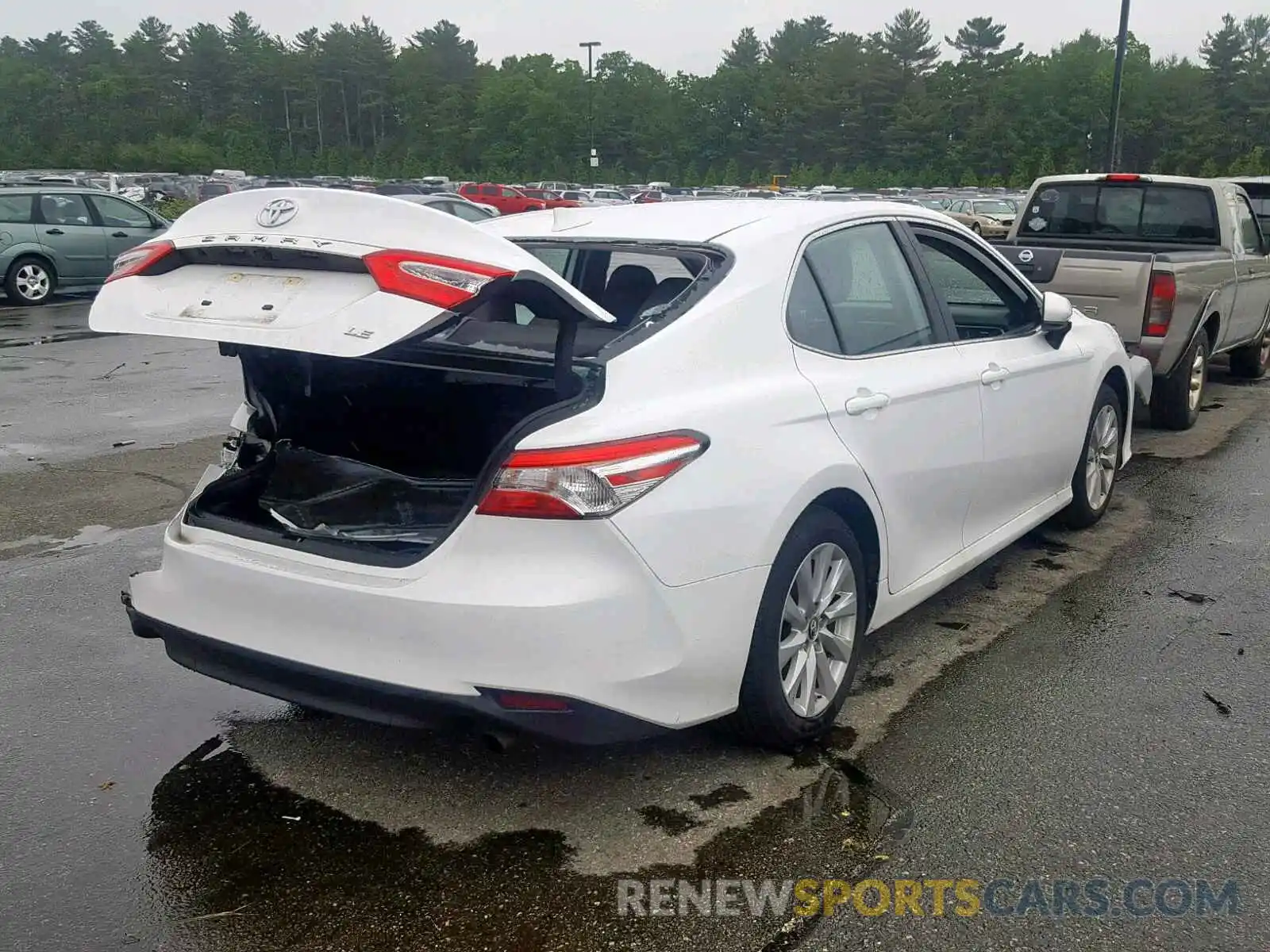 4 Photograph of a damaged car 4T1B11HK1KU754162 TOYOTA CAMRY 2019