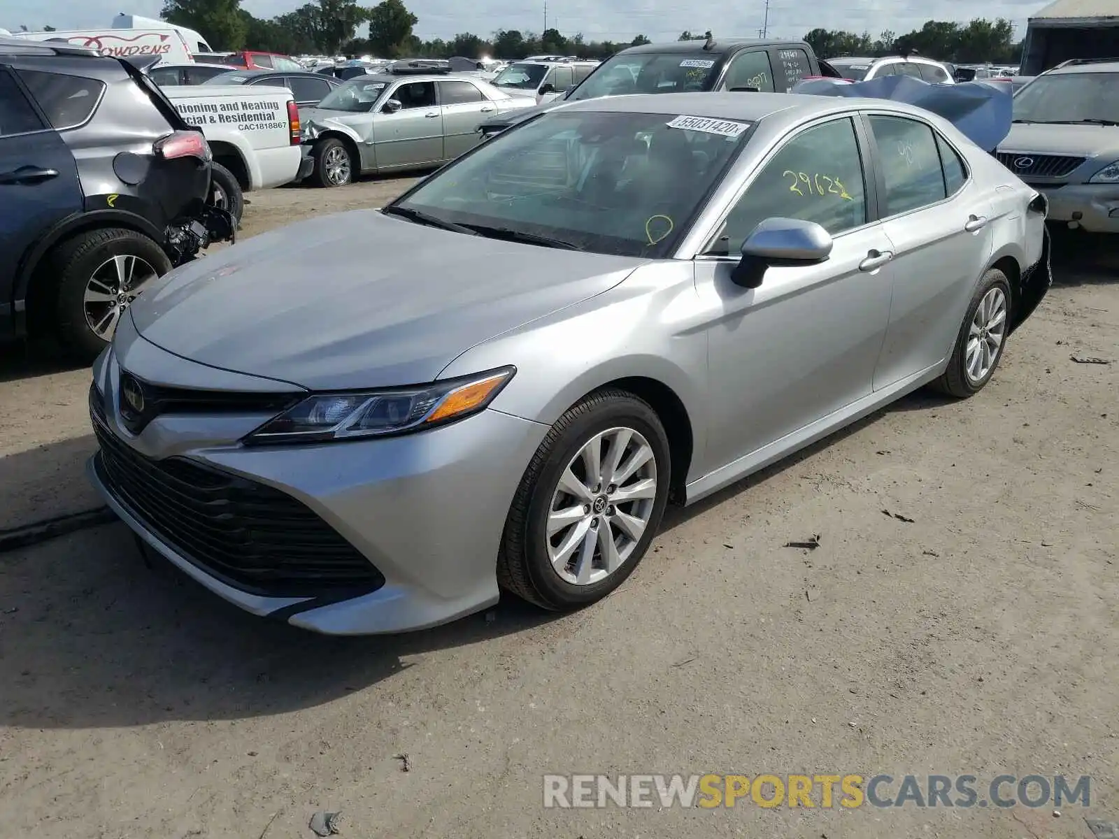 2 Photograph of a damaged car 4T1B11HK1KU754694 TOYOTA CAMRY 2019