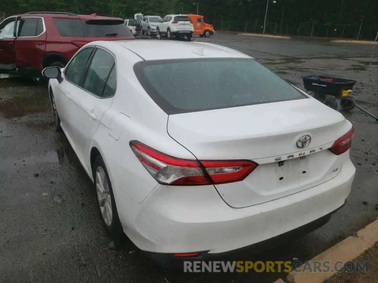 3 Photograph of a damaged car 4T1B11HK1KU757515 TOYOTA CAMRY 2019