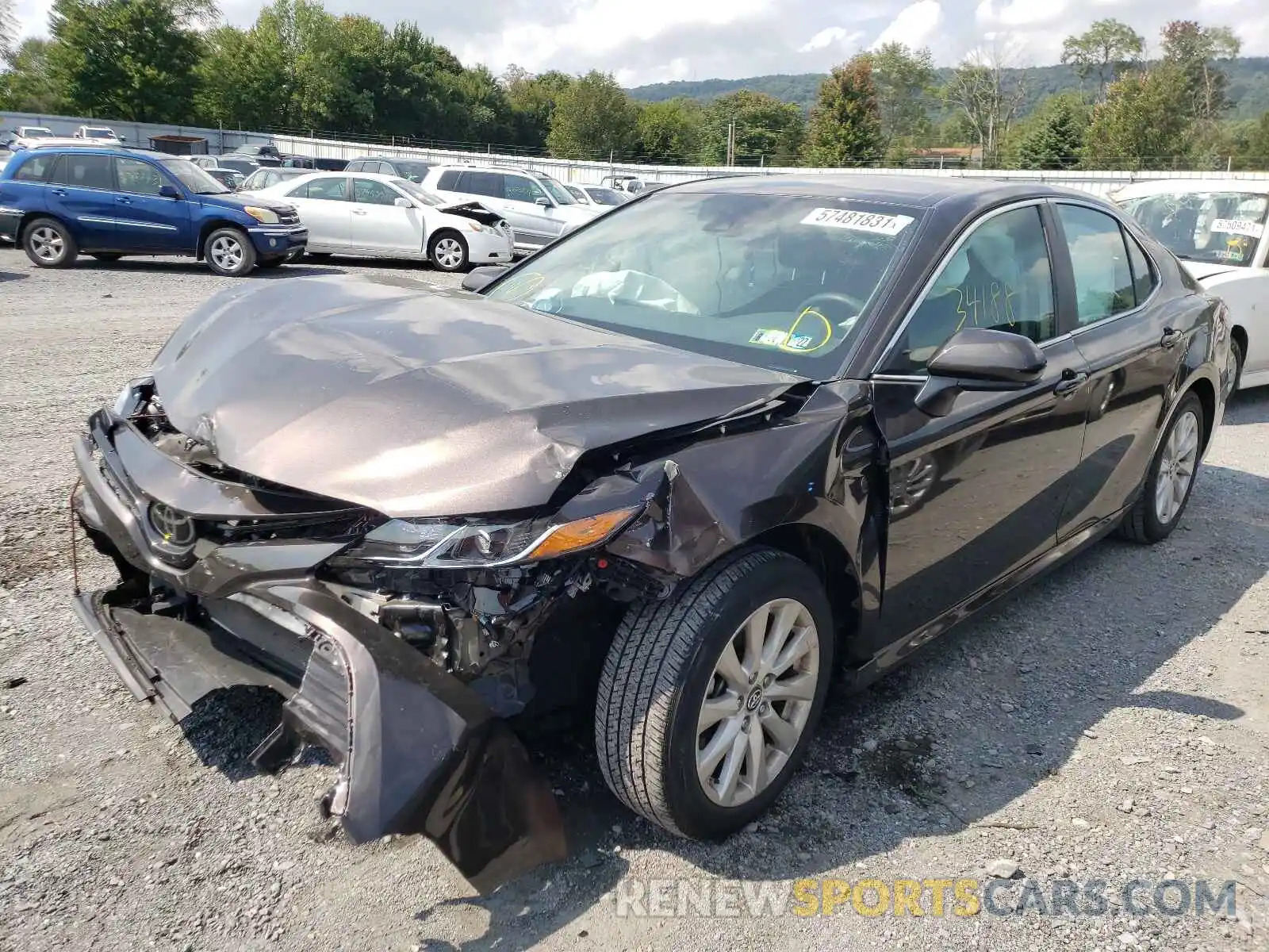 2 Photograph of a damaged car 4T1B11HK1KU759006 TOYOTA CAMRY 2019