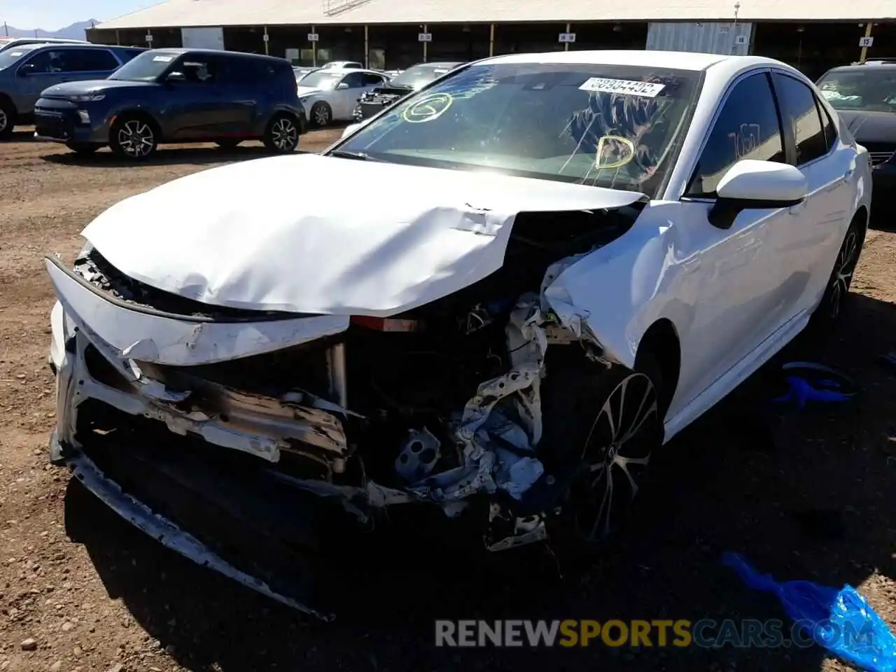 2 Photograph of a damaged car 4T1B11HK1KU759376 TOYOTA CAMRY 2019