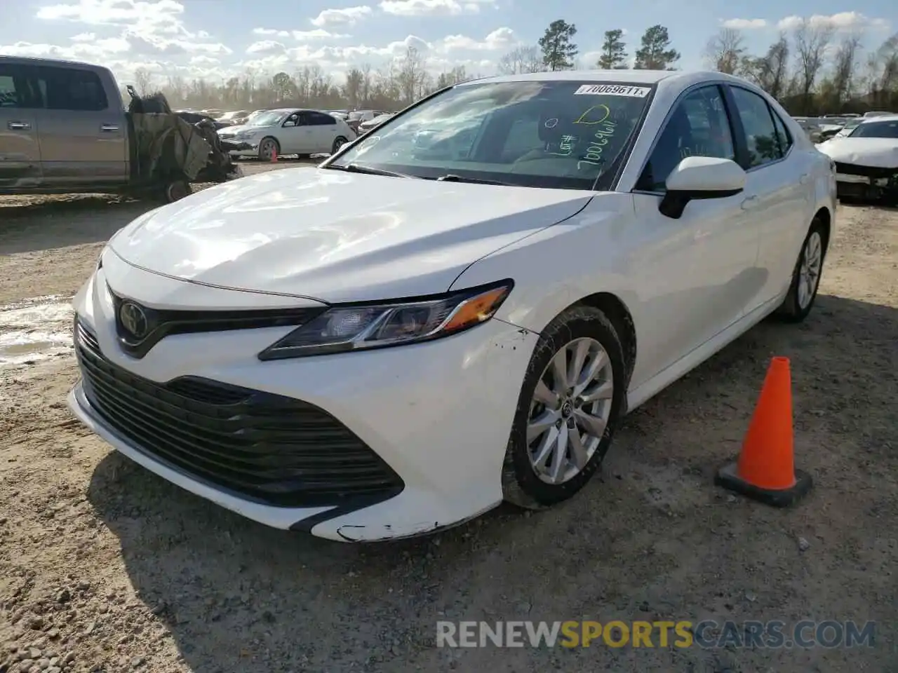 2 Photograph of a damaged car 4T1B11HK1KU759703 TOYOTA CAMRY 2019