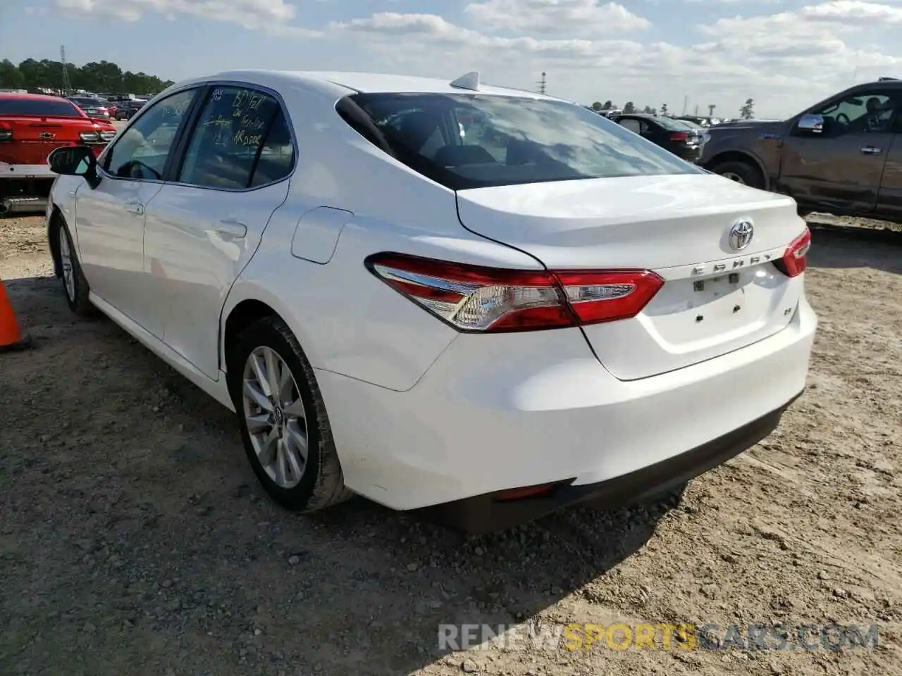 3 Photograph of a damaged car 4T1B11HK1KU759703 TOYOTA CAMRY 2019