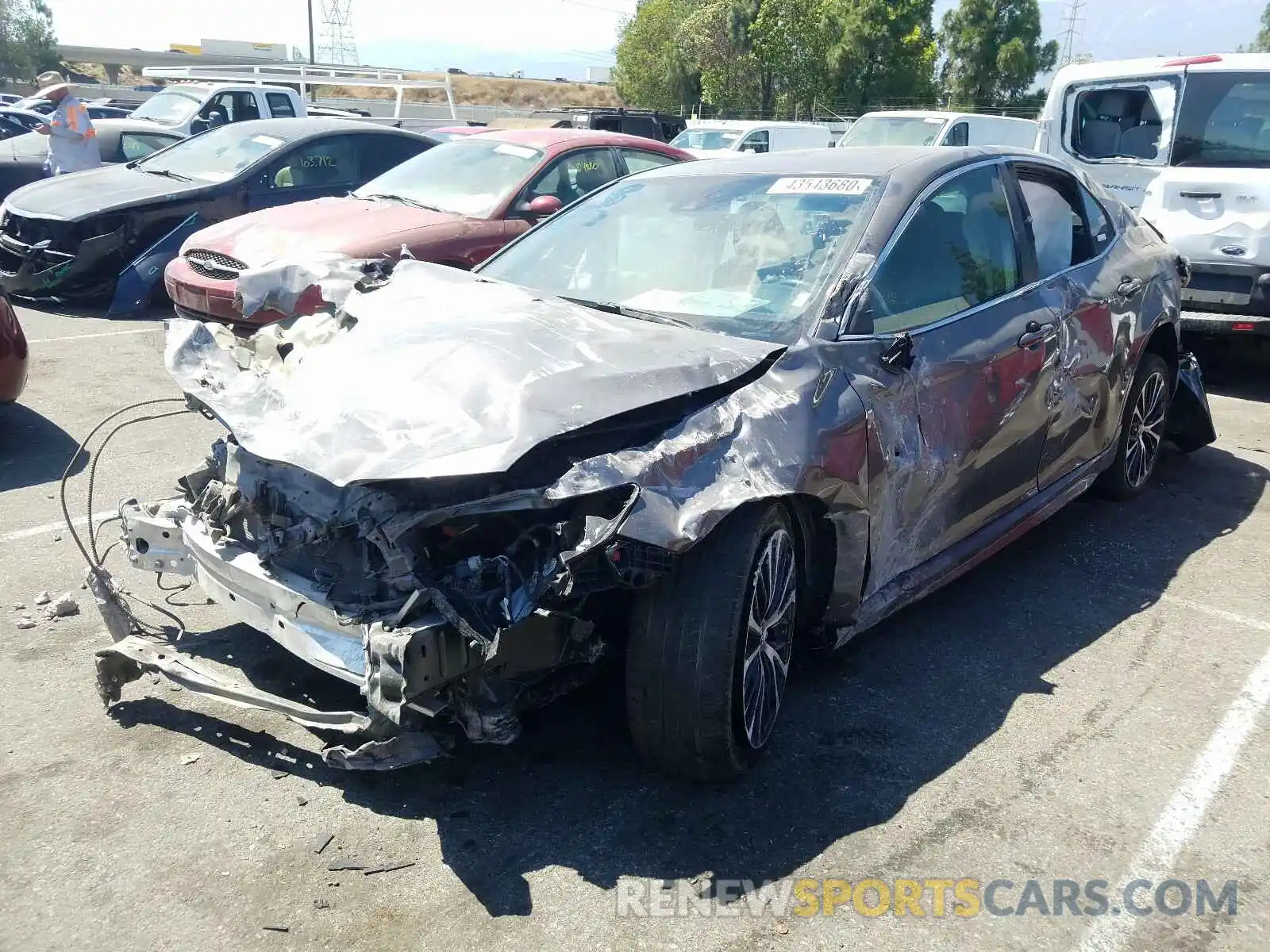 2 Photograph of a damaged car 4T1B11HK1KU760415 TOYOTA CAMRY 2019