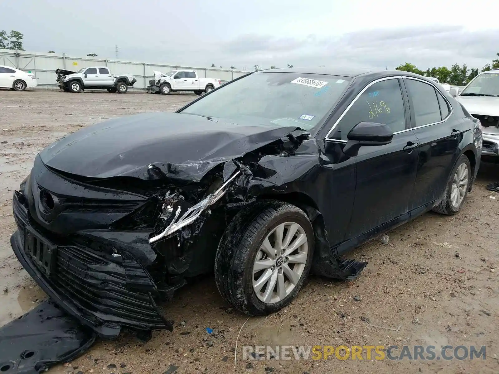 2 Photograph of a damaged car 4T1B11HK1KU760818 TOYOTA CAMRY 2019