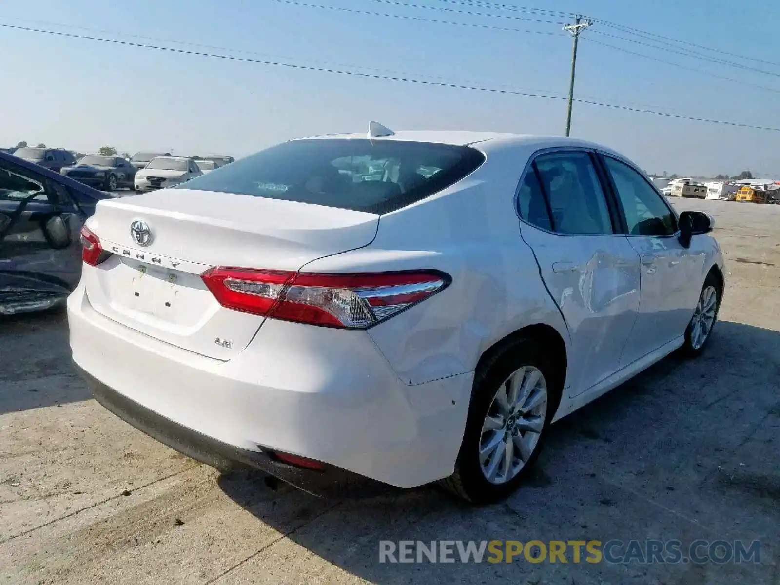 4 Photograph of a damaged car 4T1B11HK1KU761208 TOYOTA CAMRY 2019