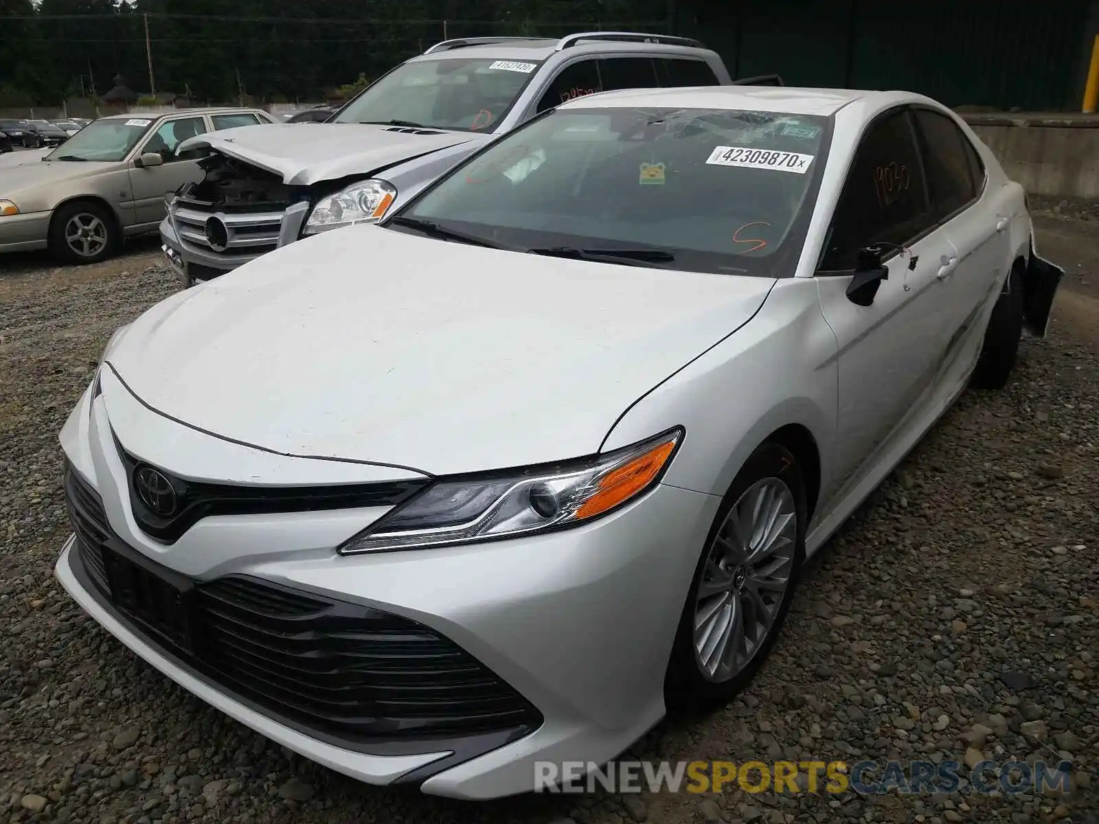 2 Photograph of a damaged car 4T1B11HK1KU765906 TOYOTA CAMRY 2019