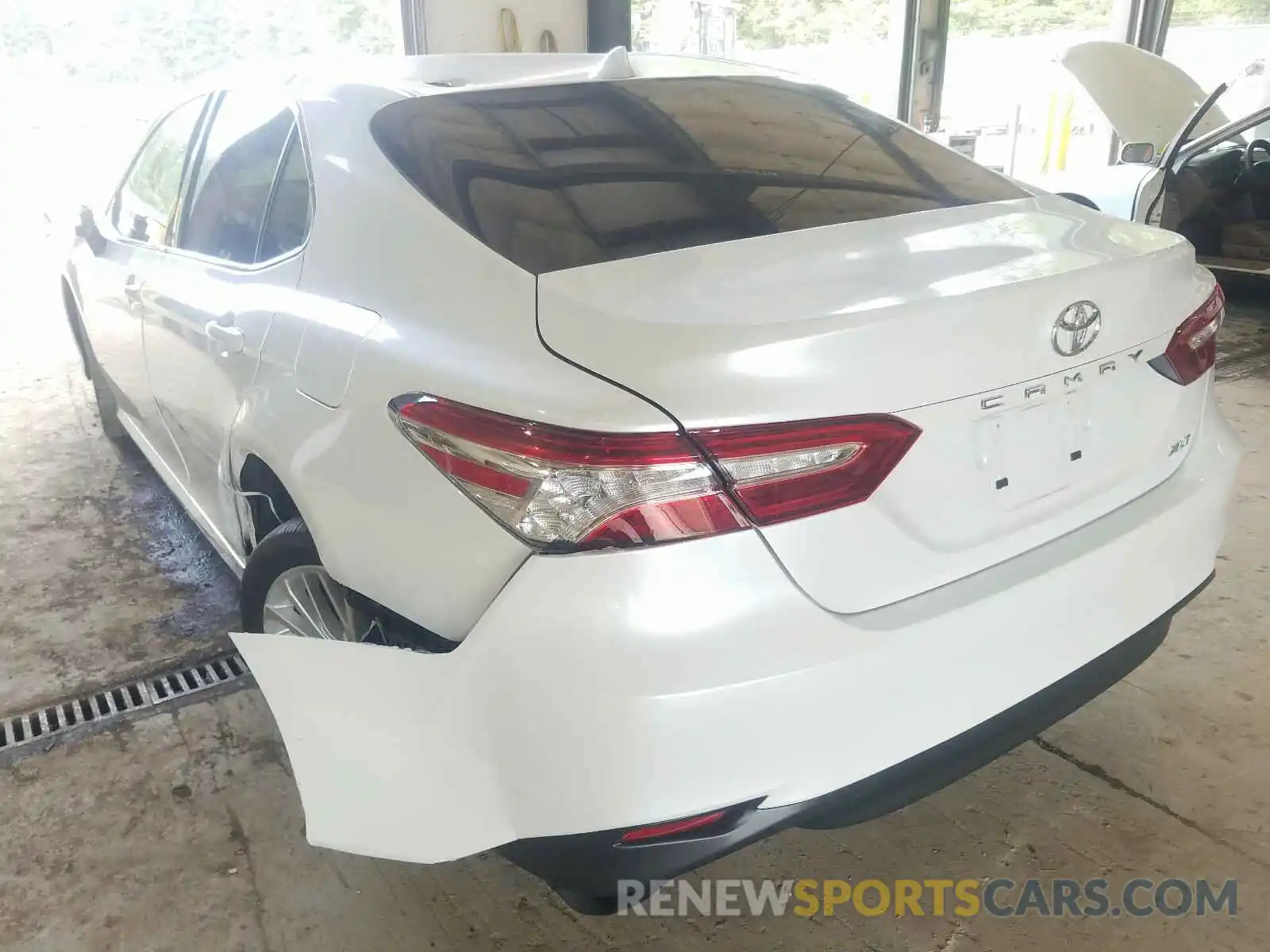 3 Photograph of a damaged car 4T1B11HK1KU765906 TOYOTA CAMRY 2019