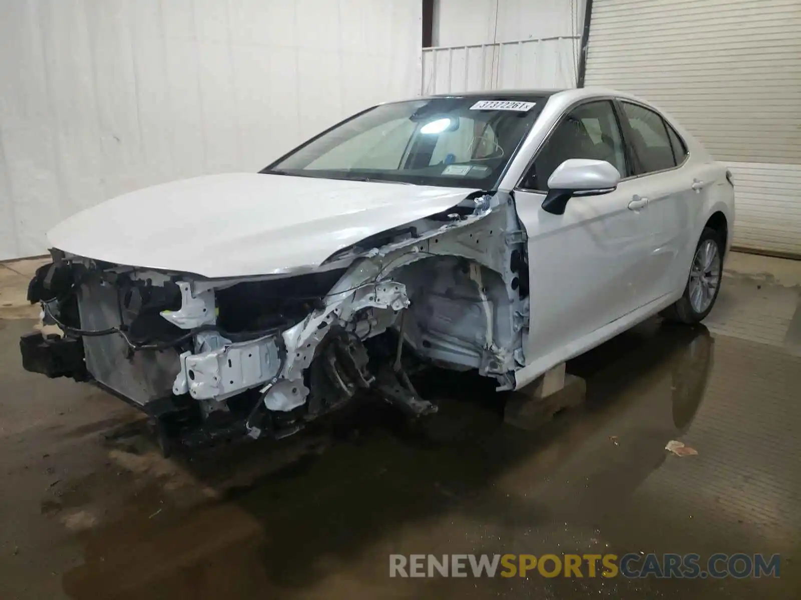 2 Photograph of a damaged car 4T1B11HK1KU767509 TOYOTA CAMRY 2019