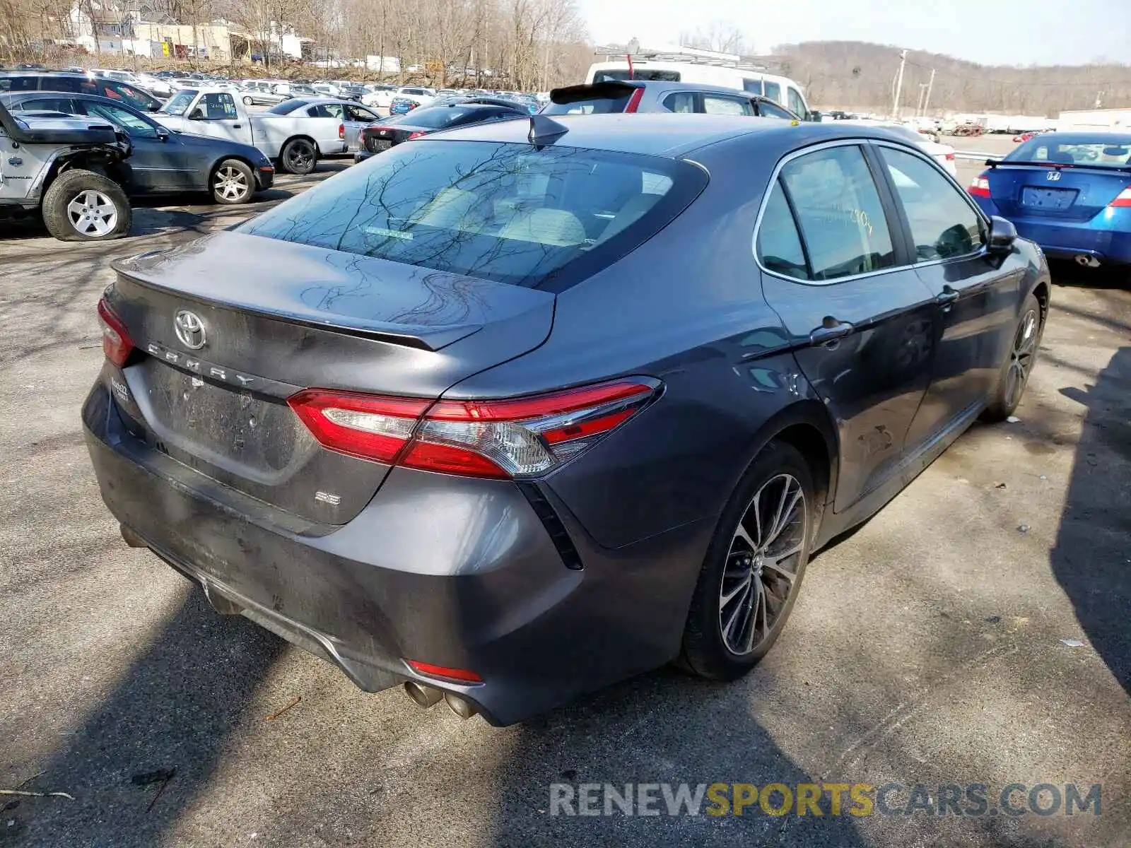 4 Photograph of a damaged car 4T1B11HK1KU768241 TOYOTA CAMRY 2019