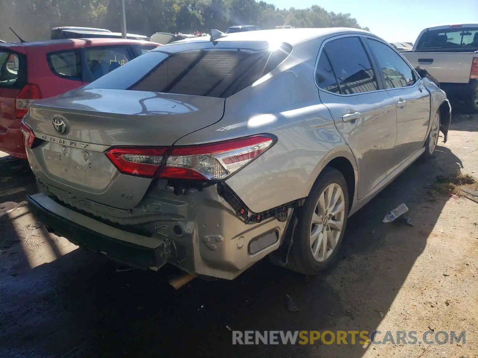 4 Photograph of a damaged car 4T1B11HK1KU768319 TOYOTA CAMRY 2019