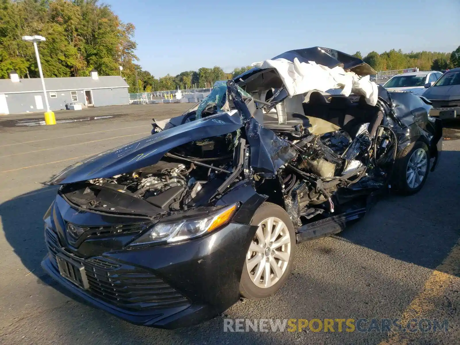 2 Photograph of a damaged car 4T1B11HK1KU768594 TOYOTA CAMRY 2019