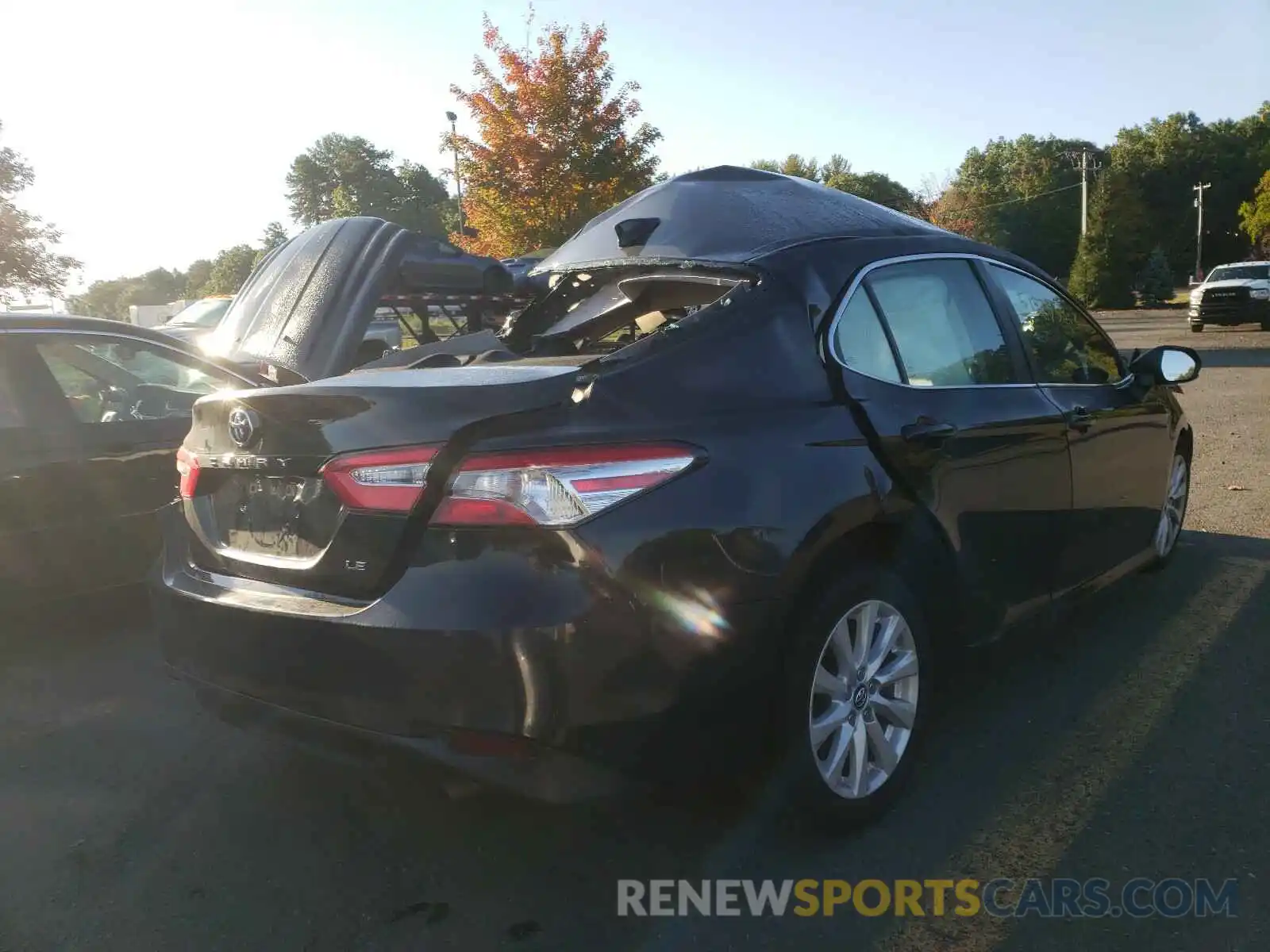 4 Photograph of a damaged car 4T1B11HK1KU768594 TOYOTA CAMRY 2019