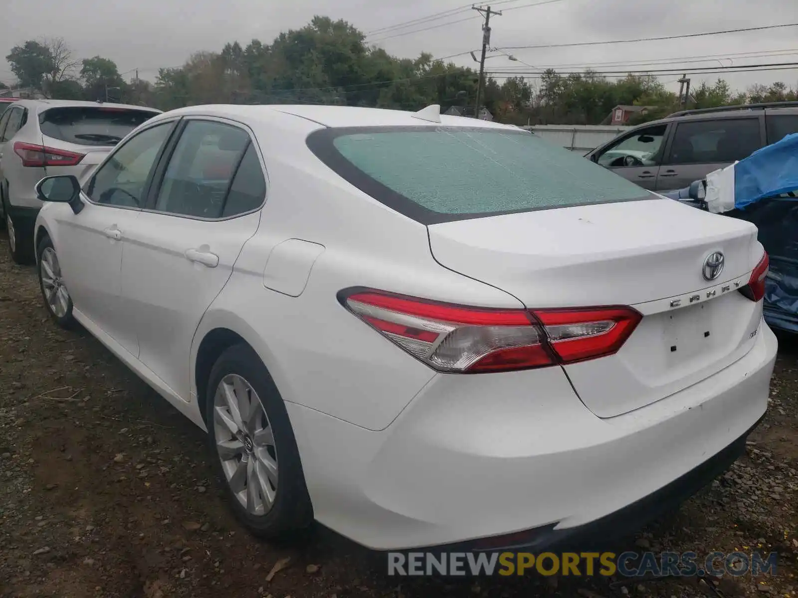 3 Photograph of a damaged car 4T1B11HK1KU769843 TOYOTA CAMRY 2019