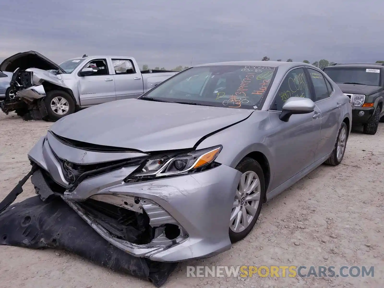 2 Photograph of a damaged car 4T1B11HK1KU770958 TOYOTA CAMRY 2019