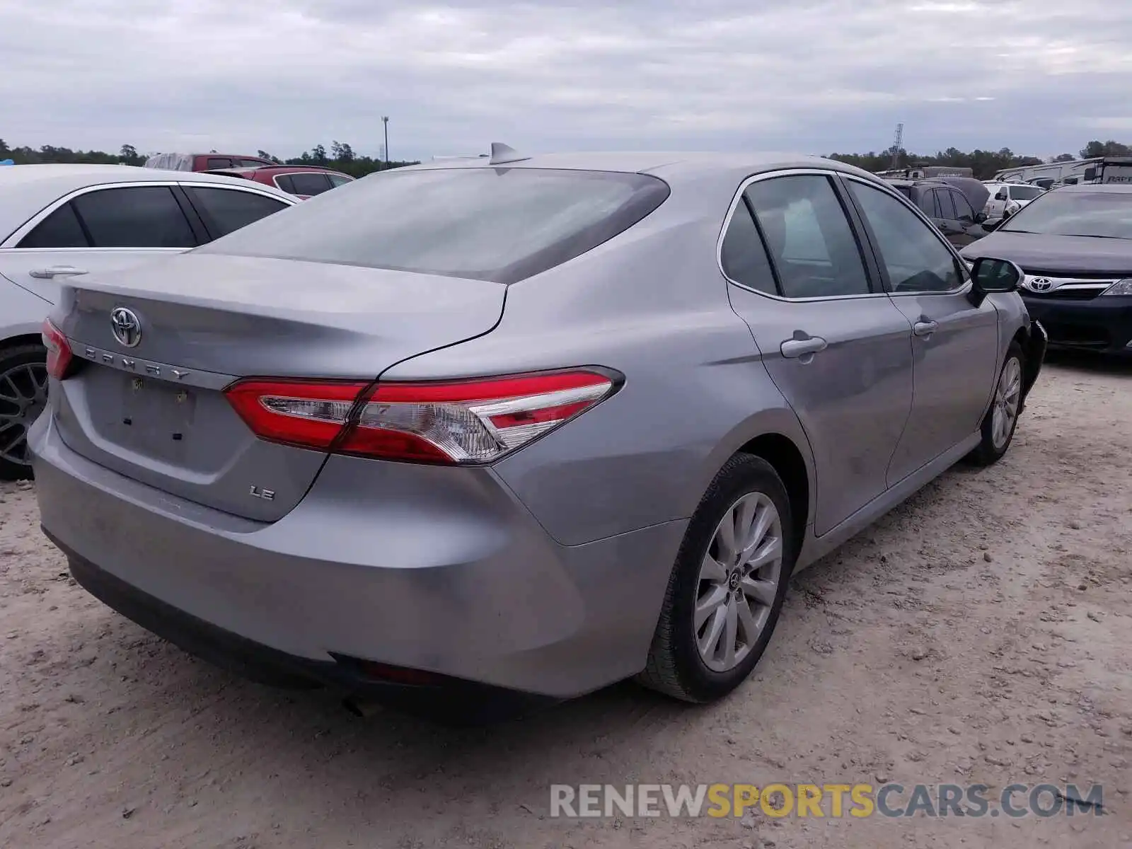 4 Photograph of a damaged car 4T1B11HK1KU770958 TOYOTA CAMRY 2019