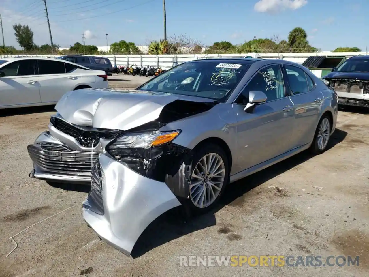 2 Photograph of a damaged car 4T1B11HK1KU775383 TOYOTA CAMRY 2019