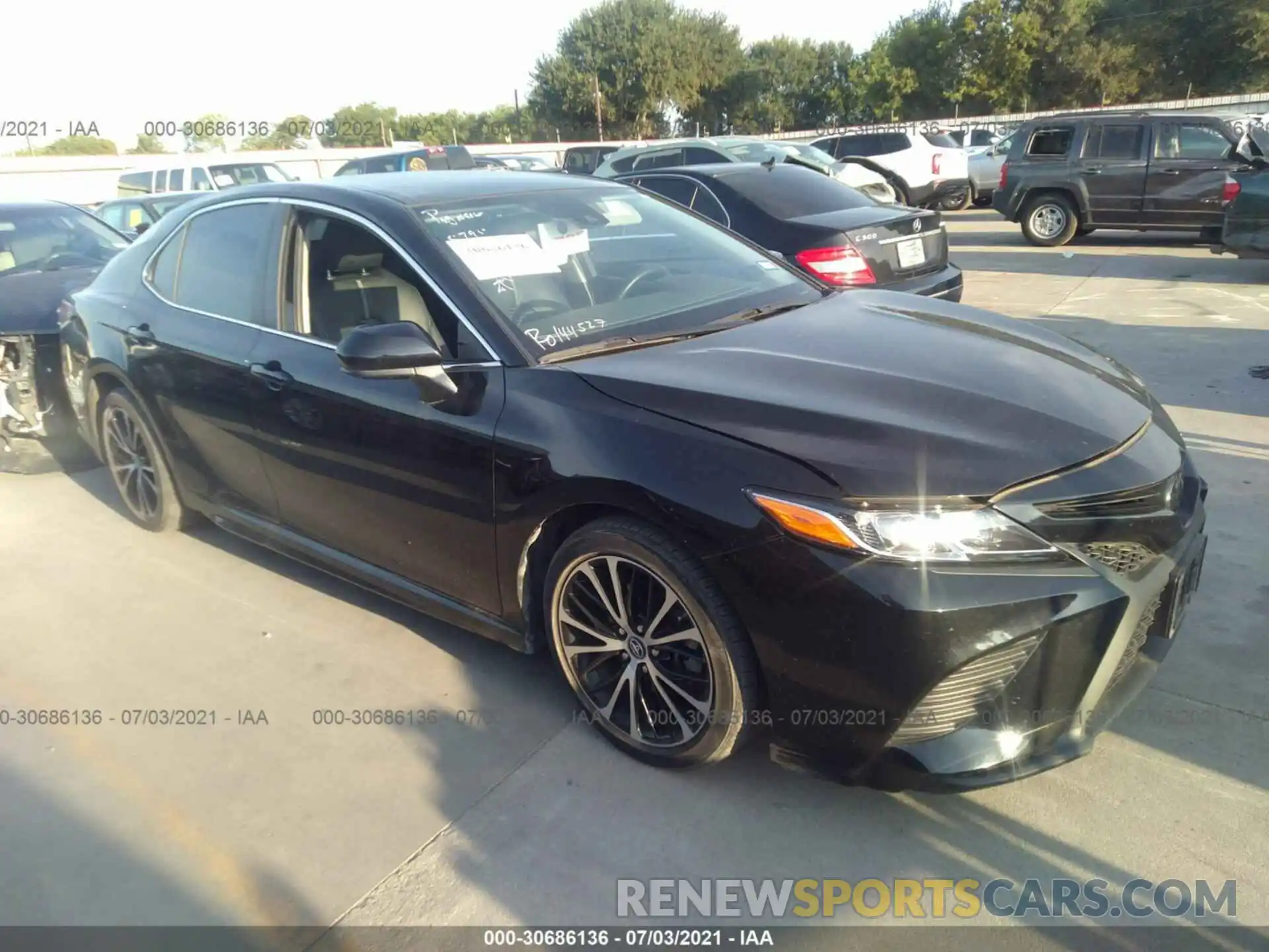 1 Photograph of a damaged car 4T1B11HK1KU778252 TOYOTA CAMRY 2019