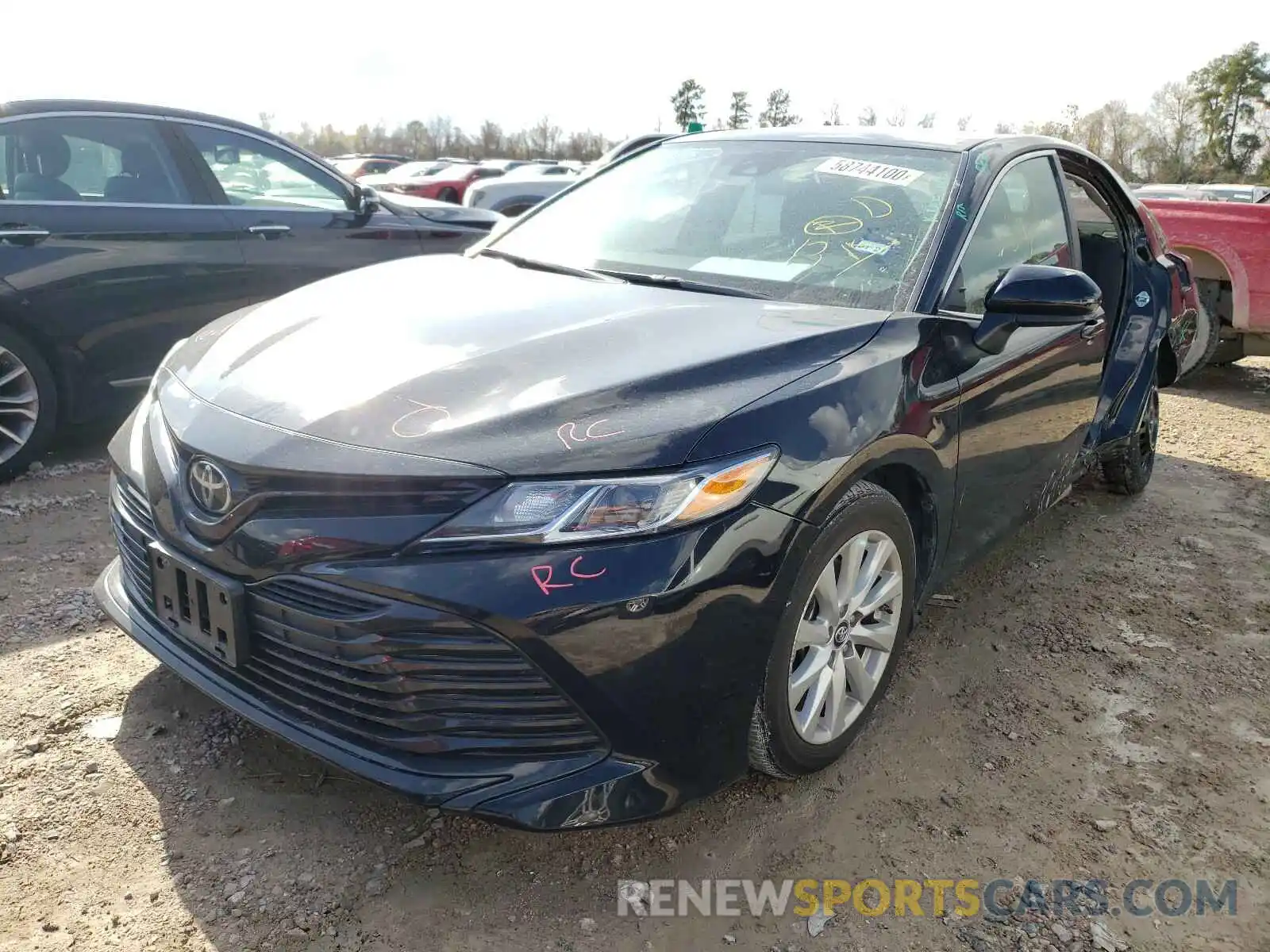 2 Photograph of a damaged car 4T1B11HK1KU784665 TOYOTA CAMRY 2019