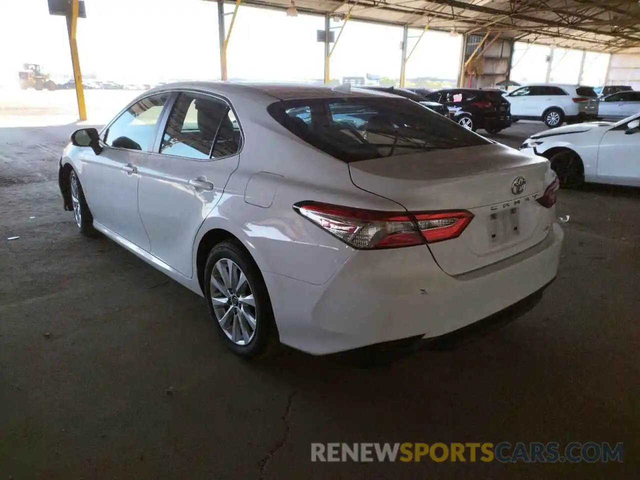 3 Photograph of a damaged car 4T1B11HK1KU786304 TOYOTA CAMRY 2019