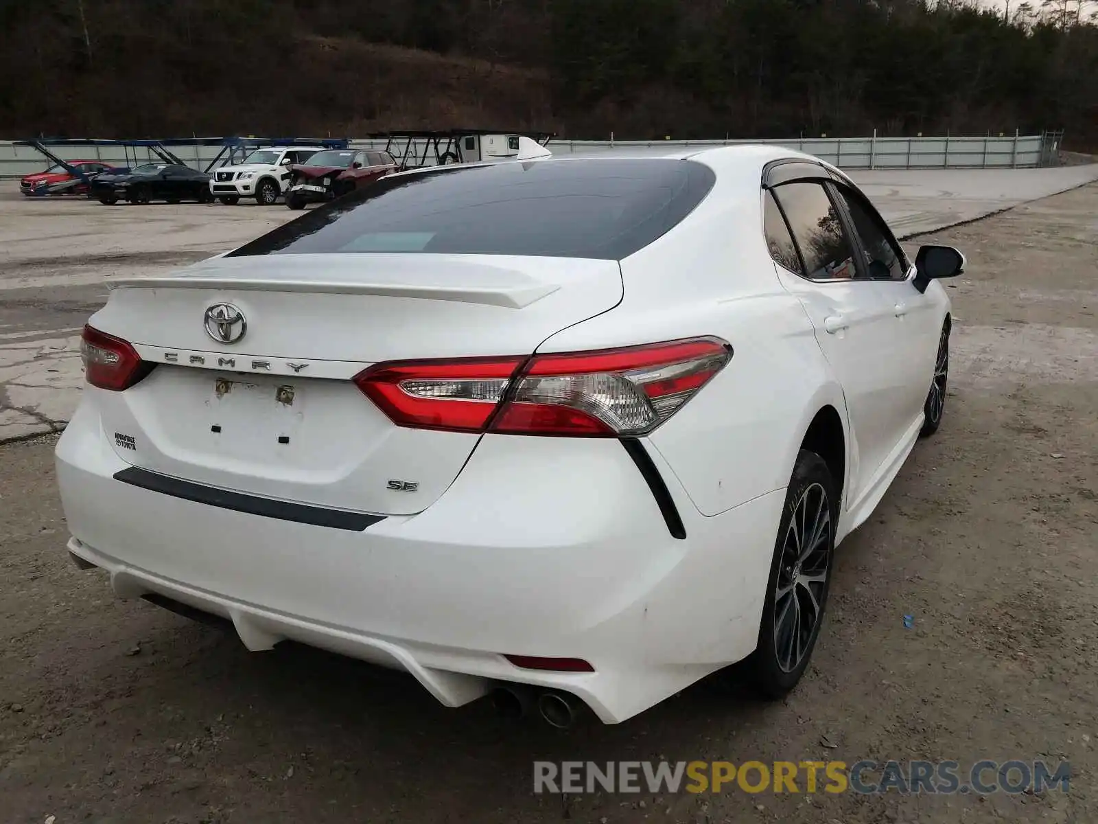 4 Photograph of a damaged car 4T1B11HK1KU787405 TOYOTA CAMRY 2019